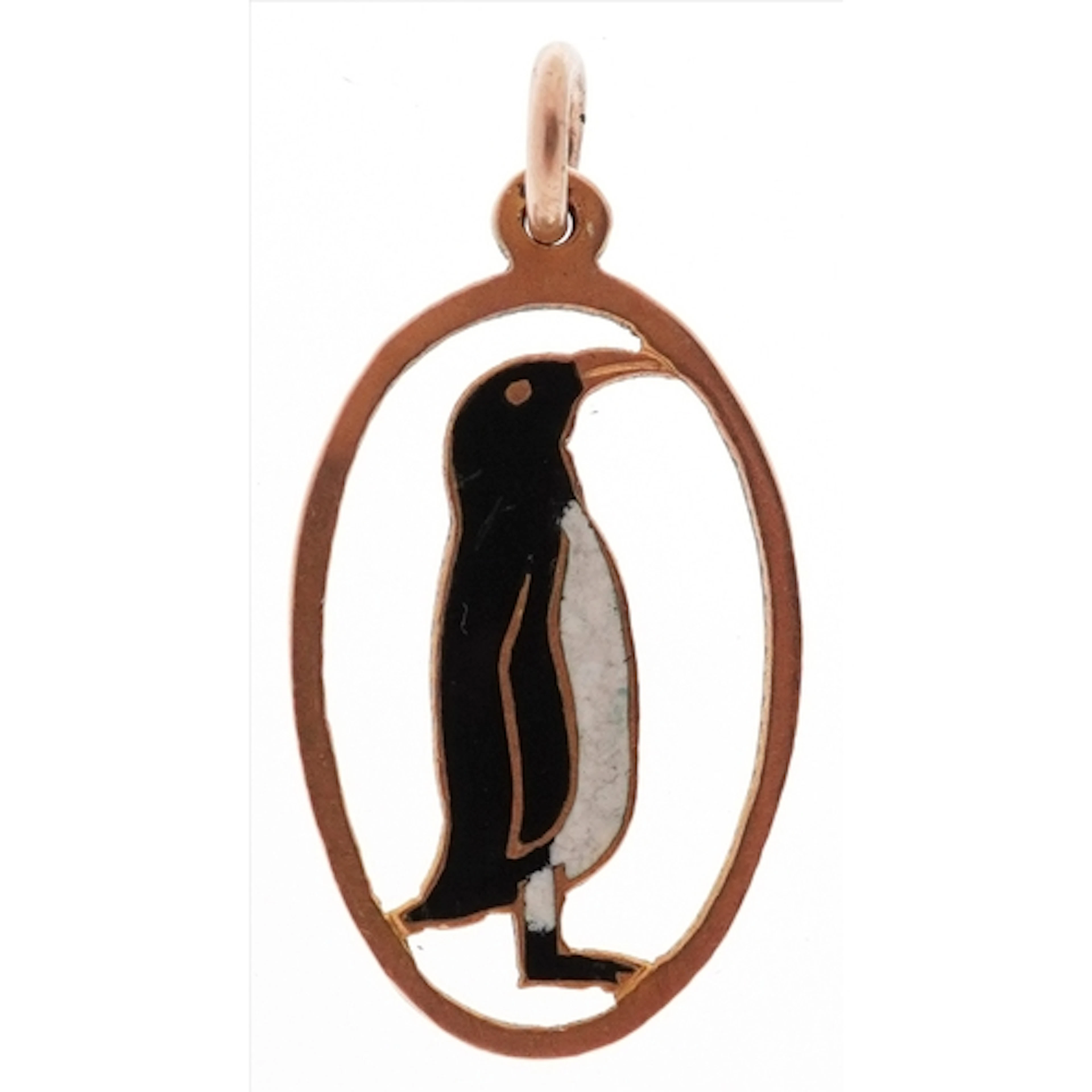 9ct gold and enamel charm in the form of a penguin, 2cm high...