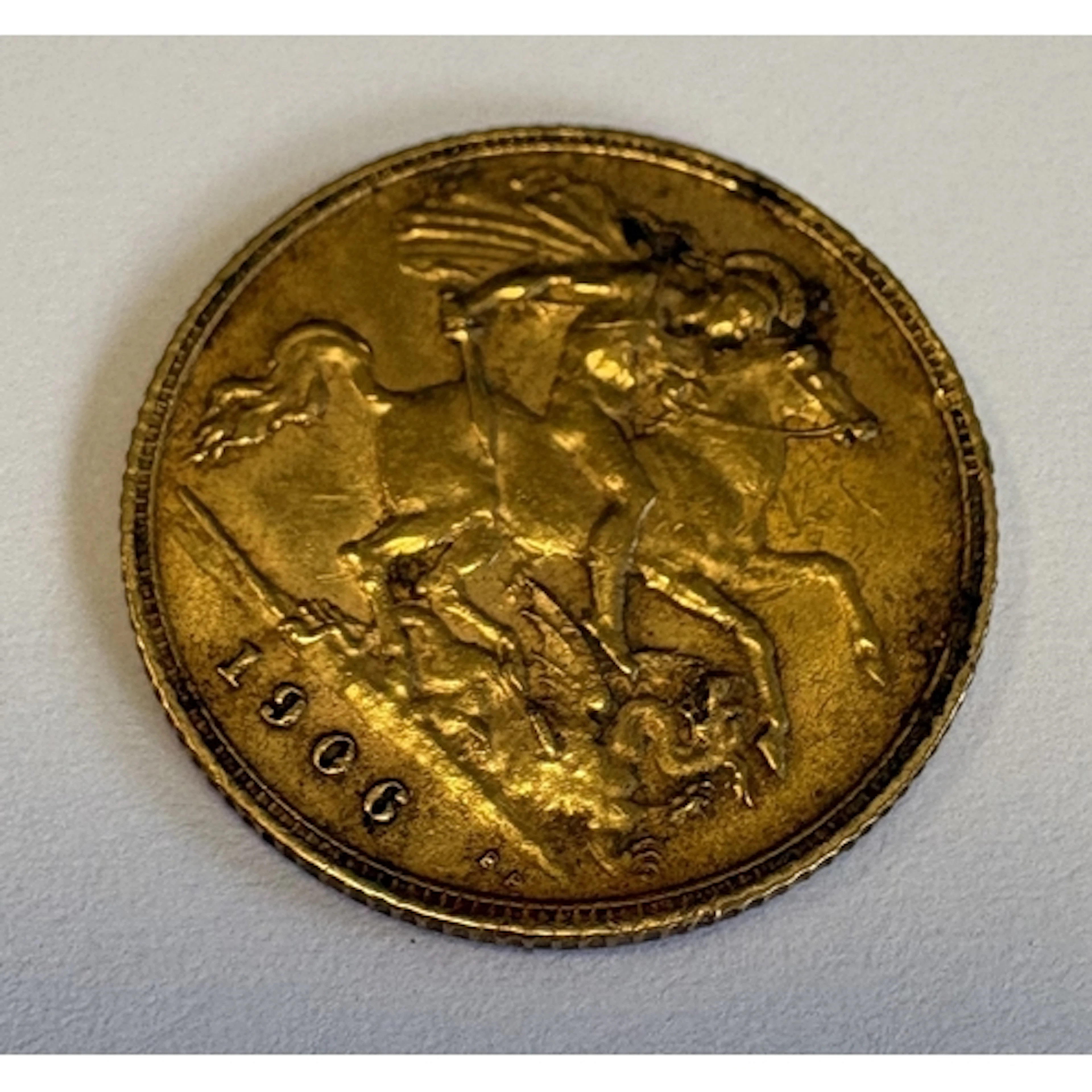 A 1906 half sovereign gold coin. Approx. 4 grams. Est. £250 ...