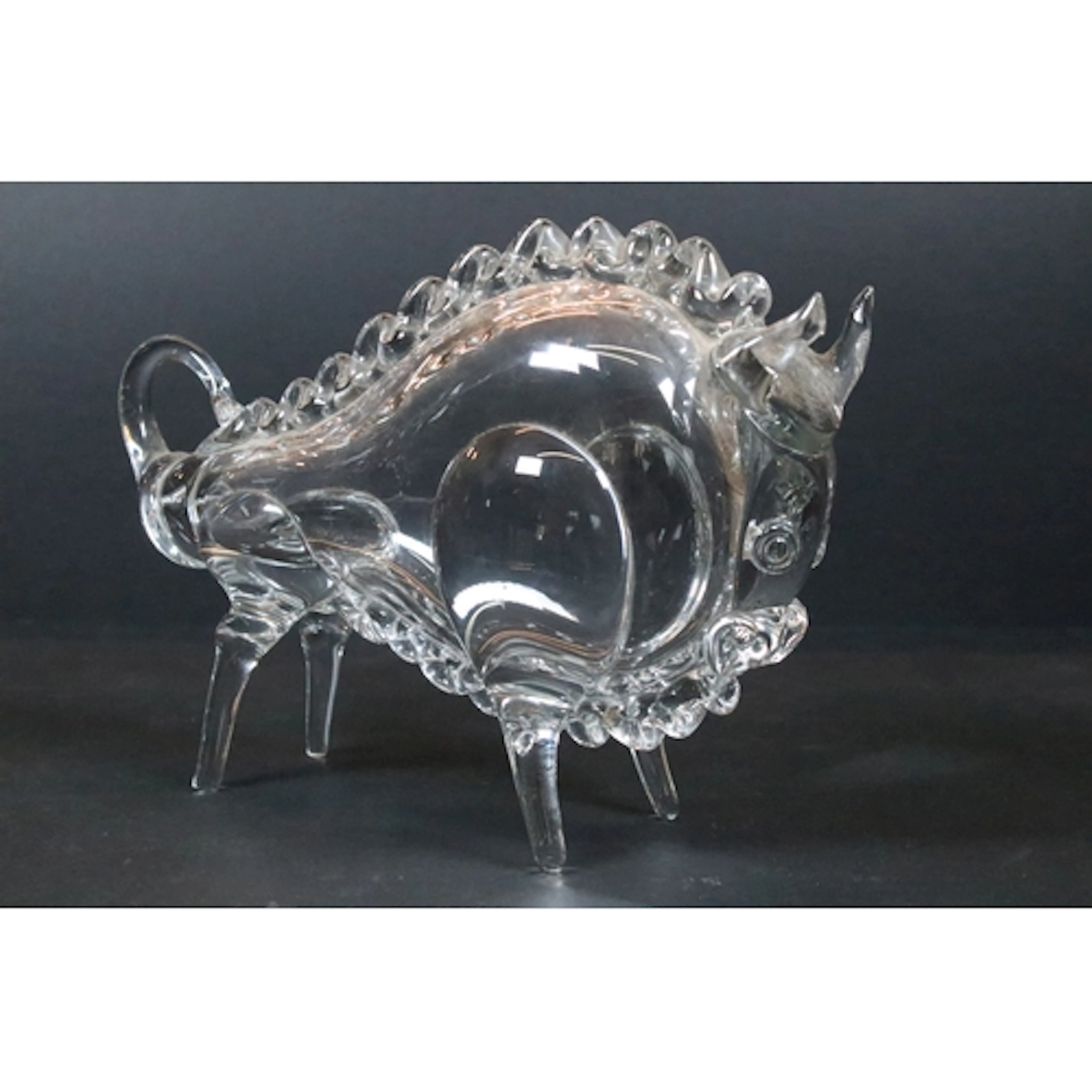 Hemah blown clear glass bull, modelled in stylised form. Mea...