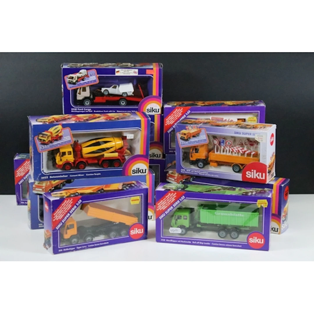 11 Boxed Siku haulage and commercial related diecast models ...