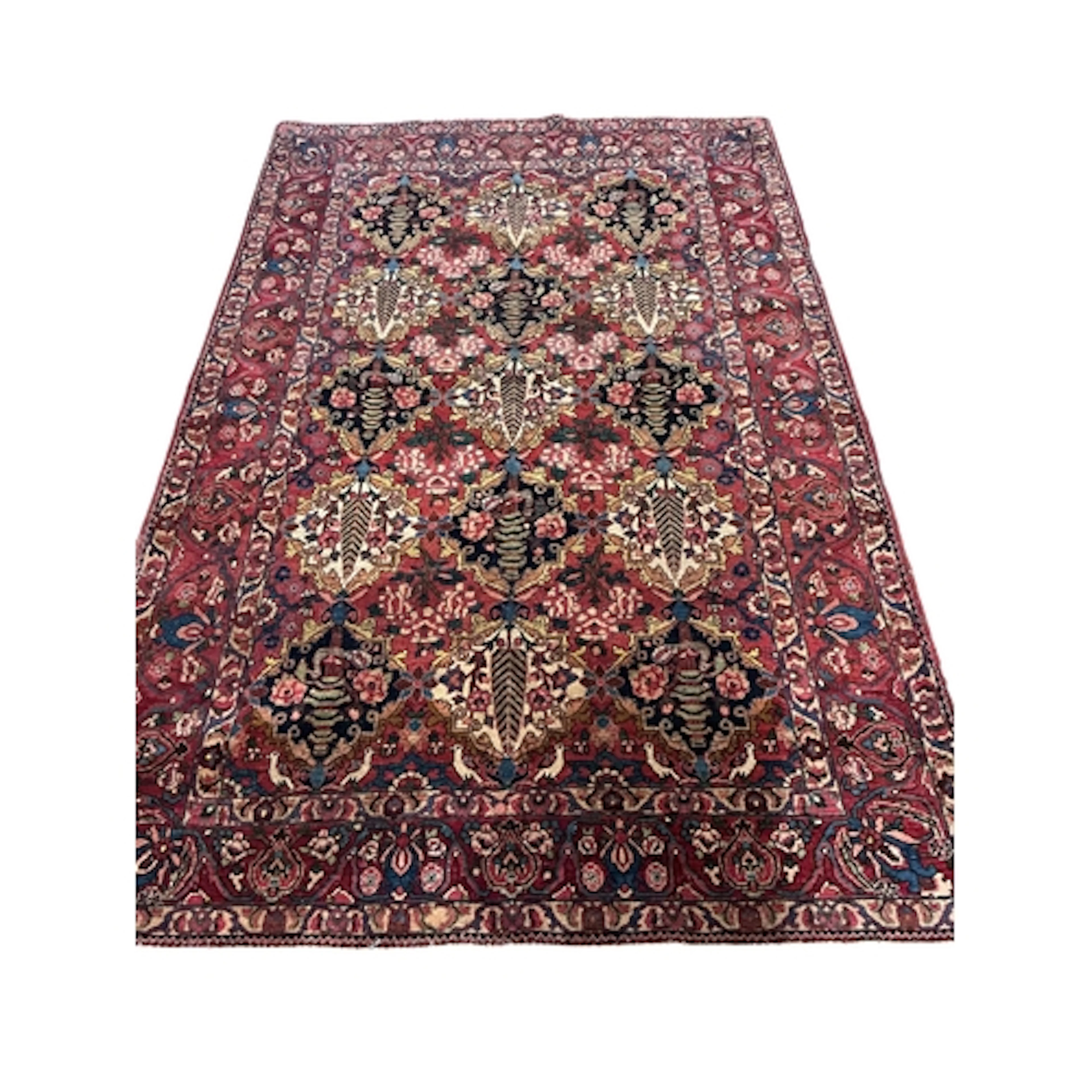 A Persian red ground Sarouk rug, 220 x 144cm