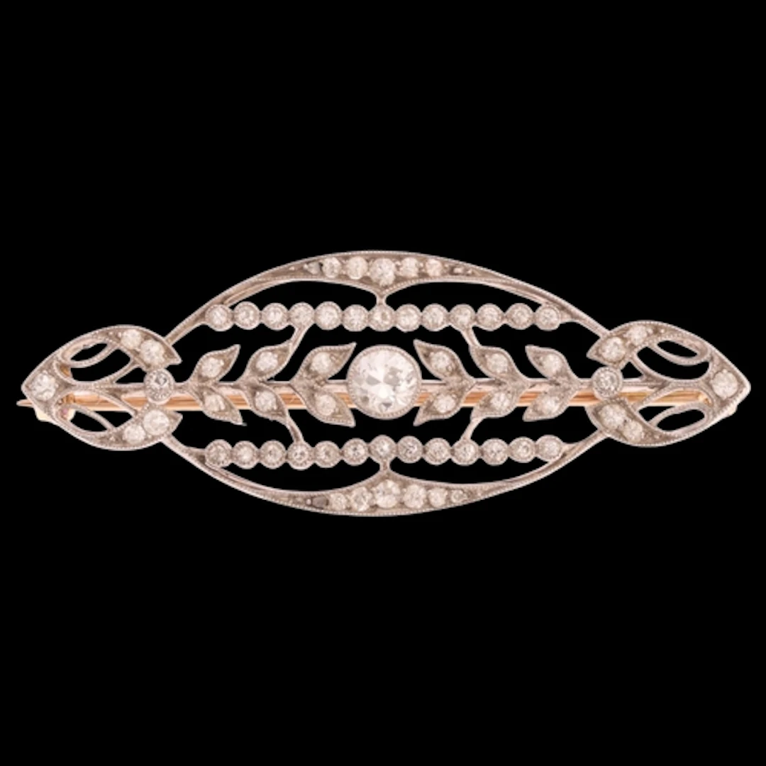 A Belle Epoque platinum diamond openwork brooch, navette wir...