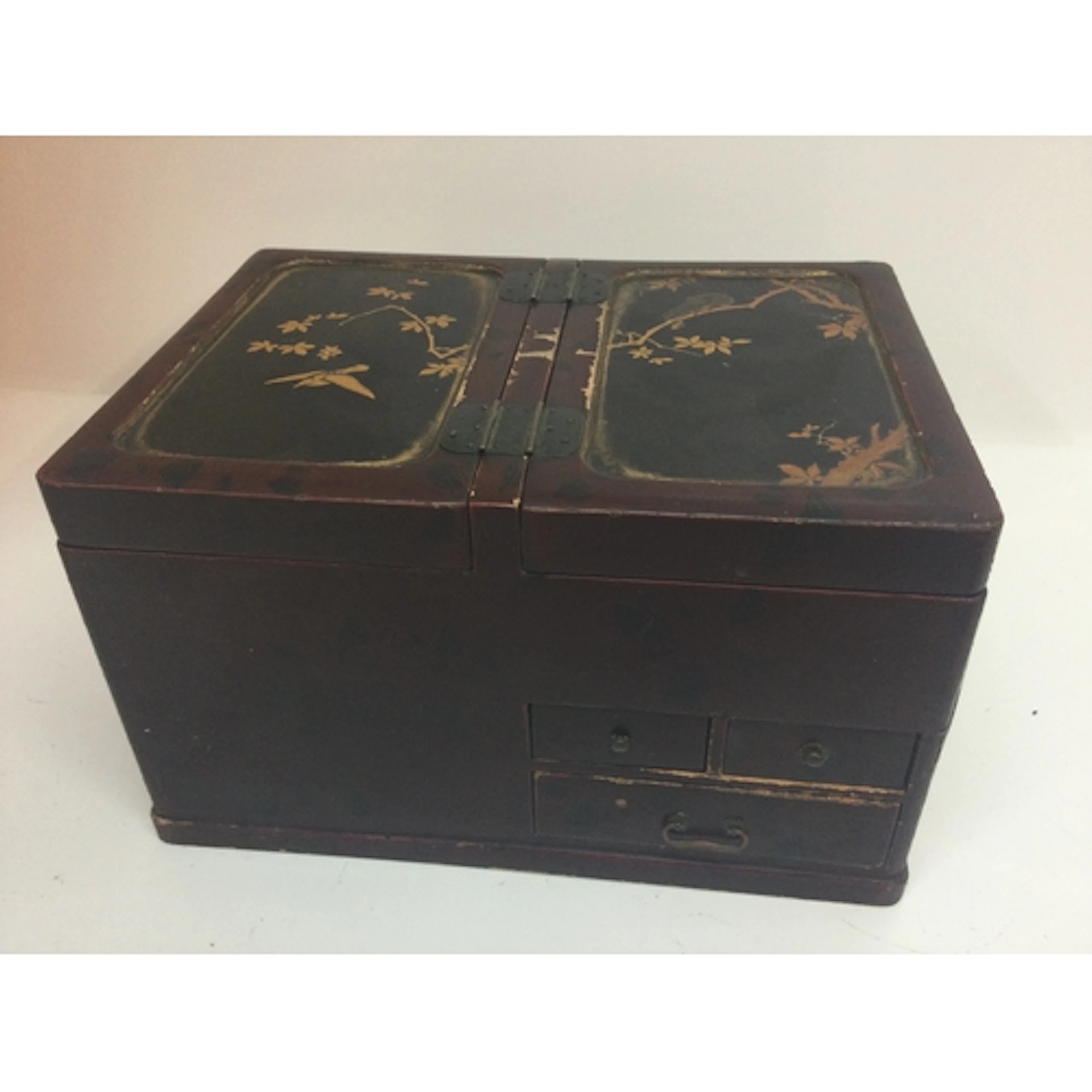 An East Asian style jewellery box, the top panels are decora...