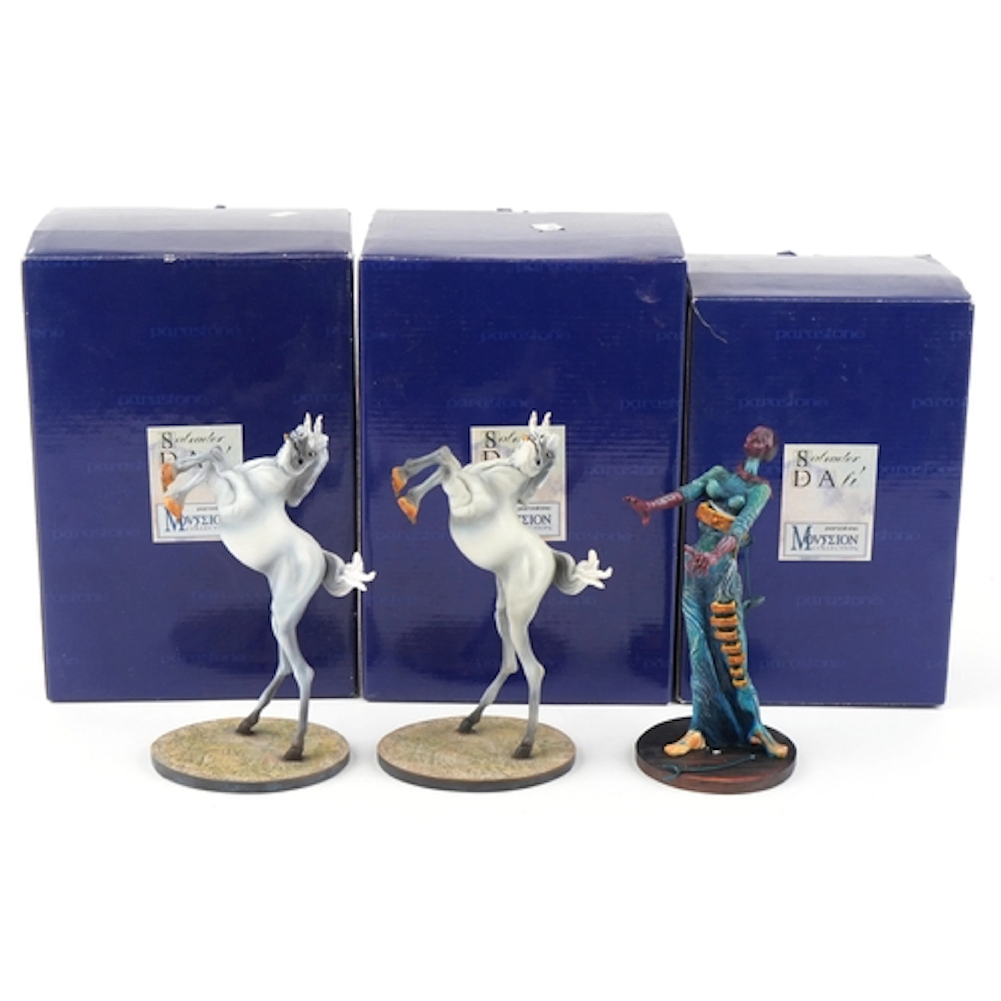 Three Parastone Salvador Dali collectable figures, the large...
