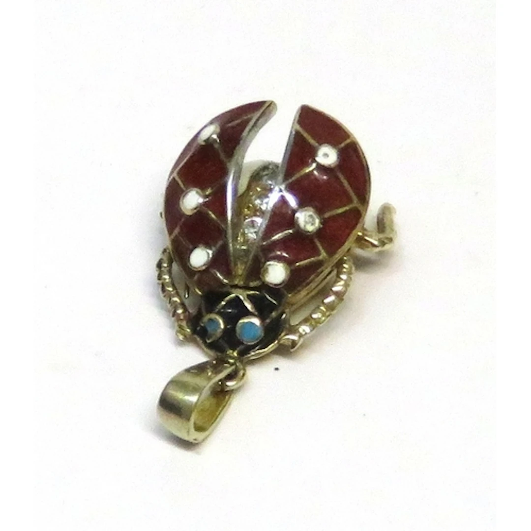 14ct Yellow gold enamel decorated pendant, in the form of an...