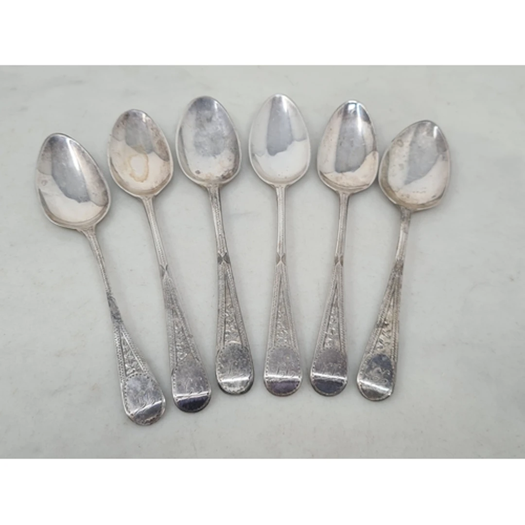 Six Georgian silver Teaspoons with bright cut engraving and ...