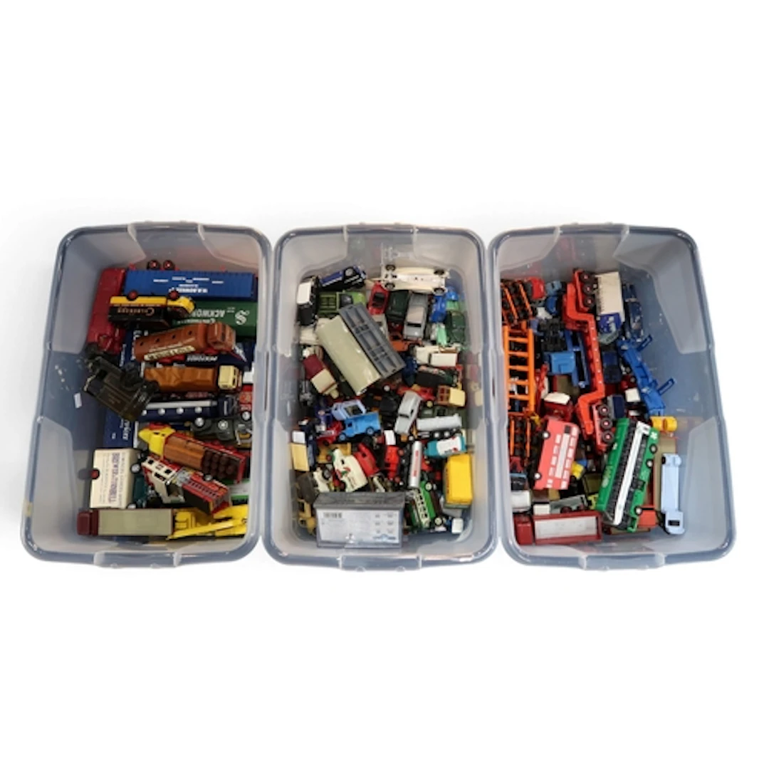 A large collection of loose diecast model vehicles, largely ...