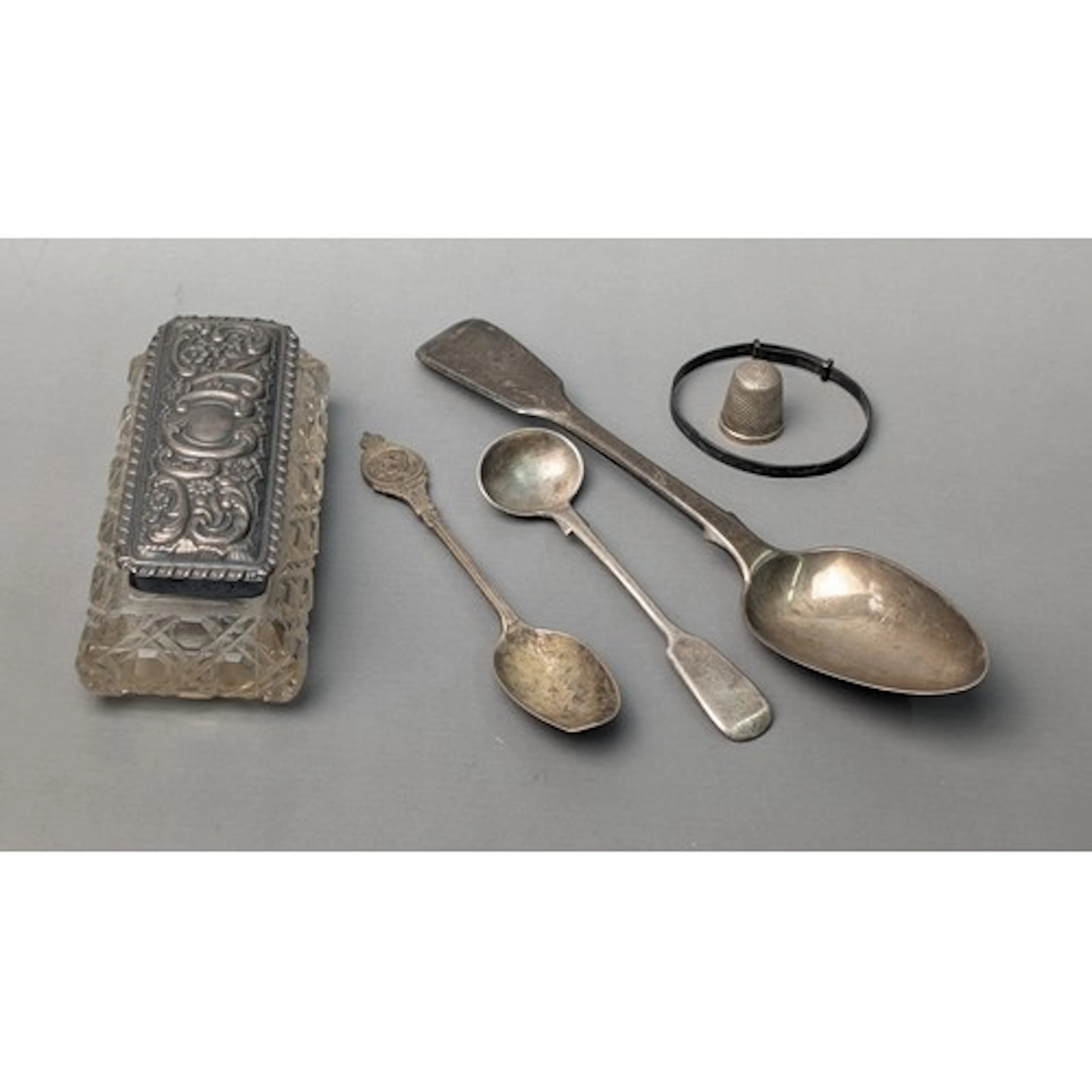 Assorted silverware, variously marked, including three spoon...