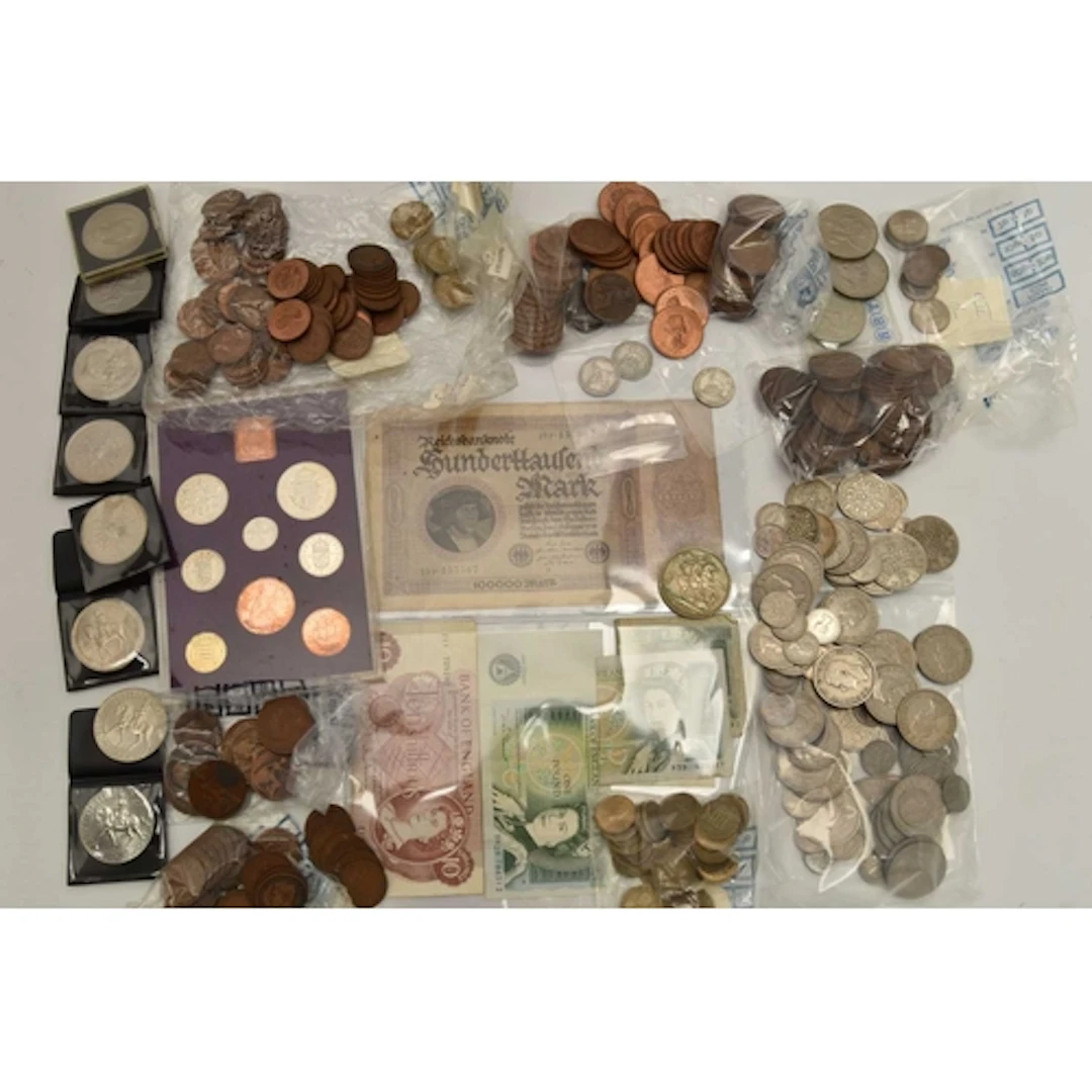A collection of coins and notes. Noted coin bags of pennies ...