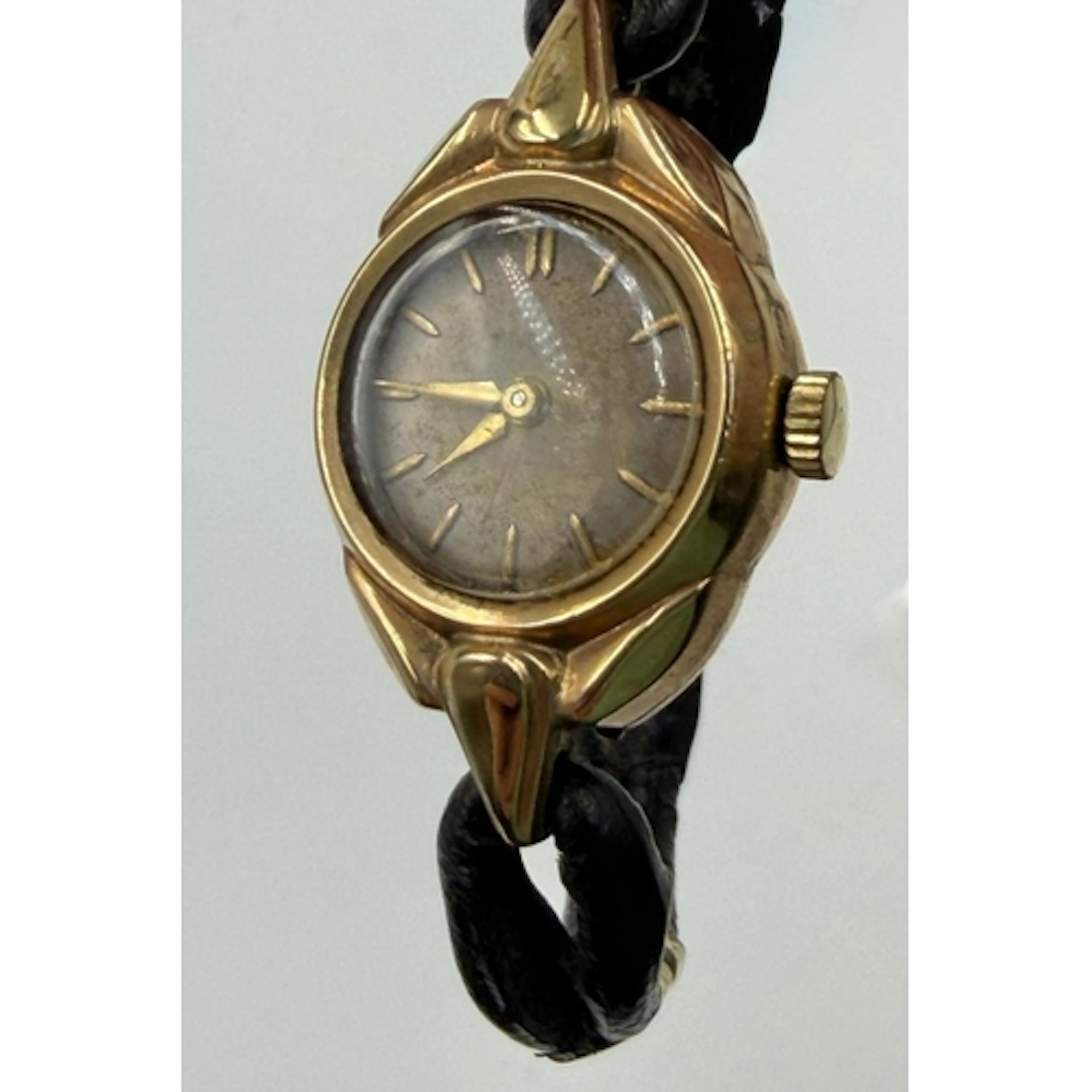 A 9ct gold Ladies Tudor watch on leather strap