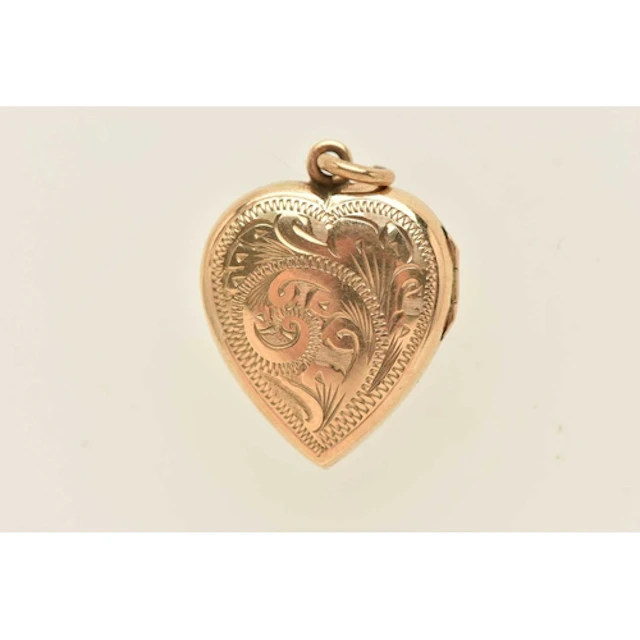 A 9CT YELLOW GOLD LOCKET, a heart form locket with scrolling...
