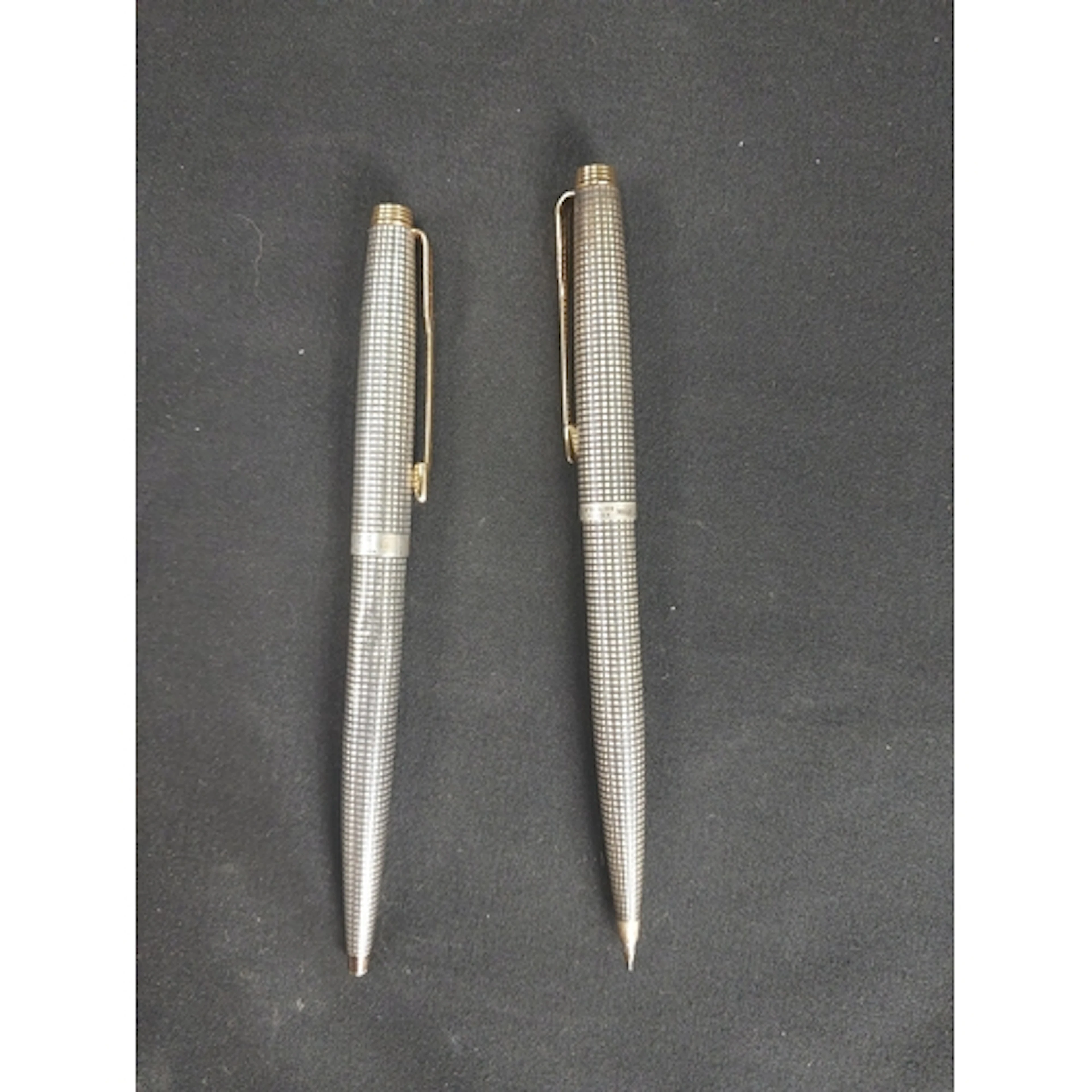 Two sterling silver cisele pattern pre 1970 Parker's, one b...