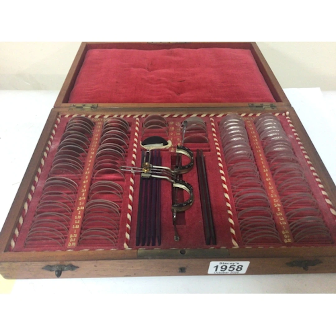 A Vintage opticians lens case well fitted interior. Mahogany...