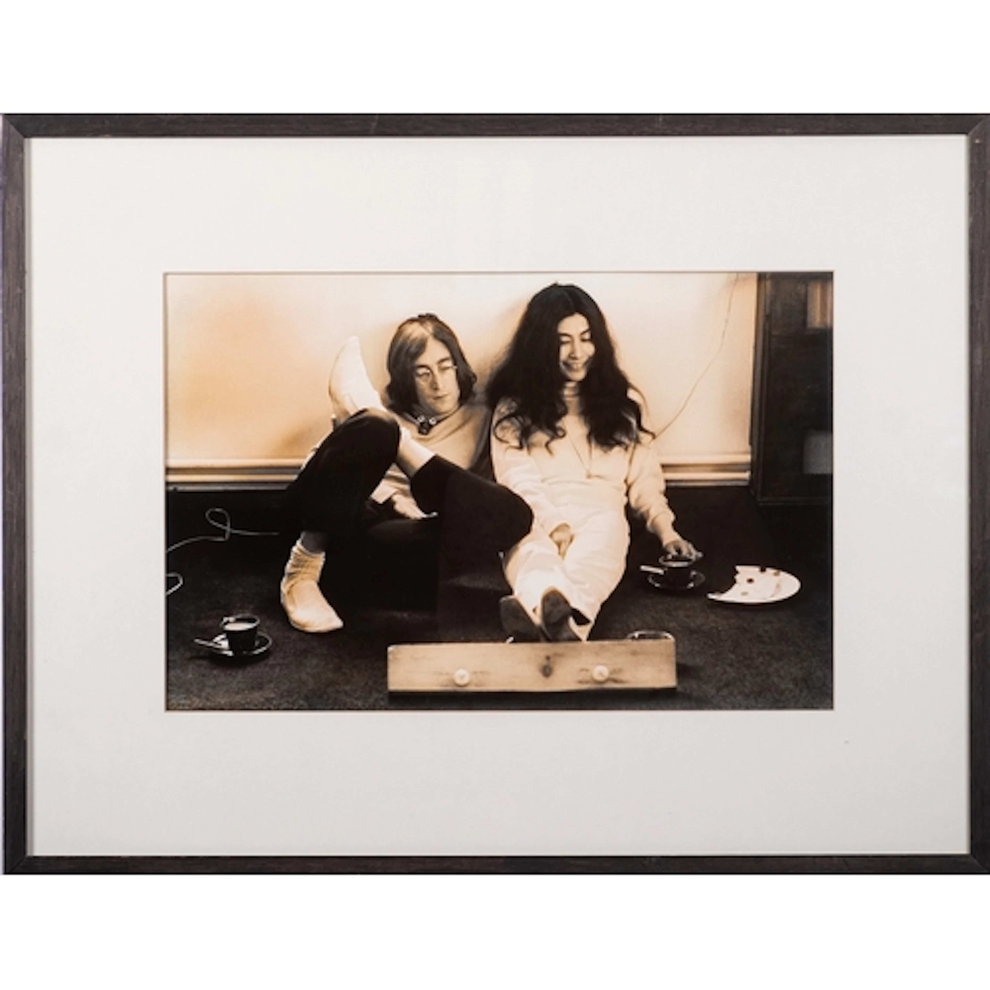 After Jane Brown. A black and white photograph of John Lenn...