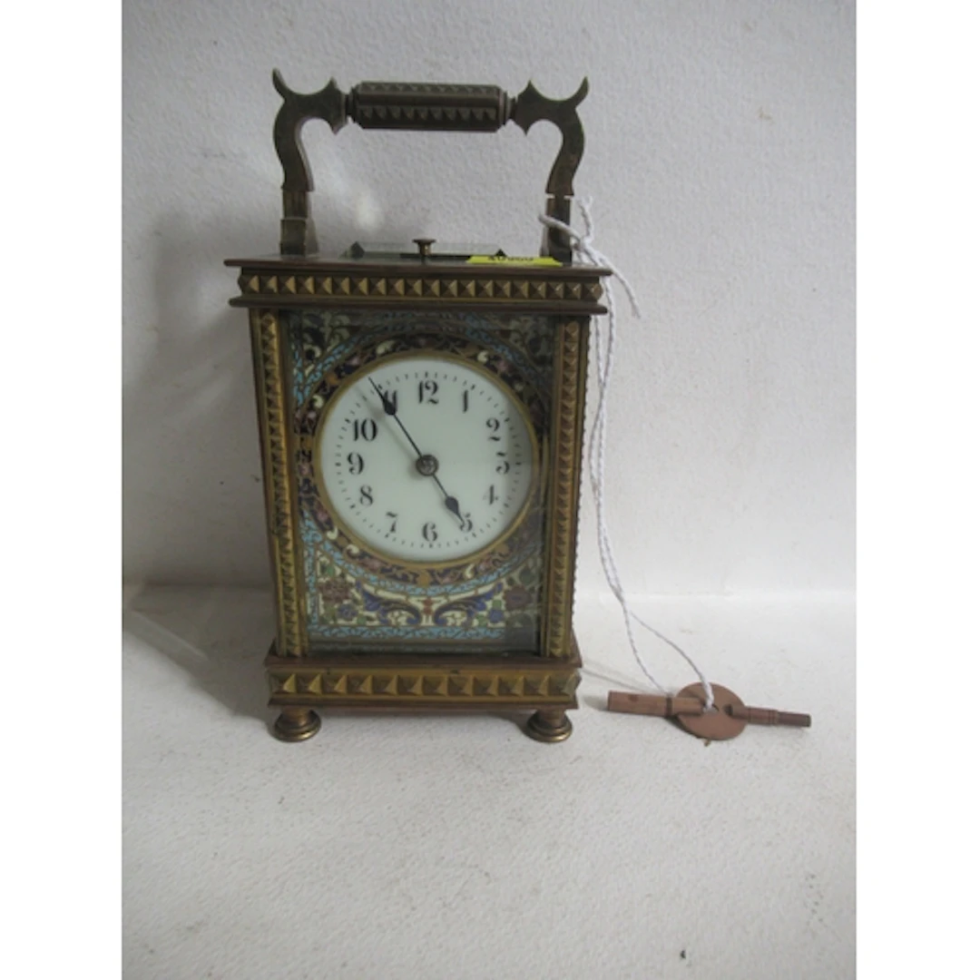 A brass cased repeating carriage clock, the white enamel dia...