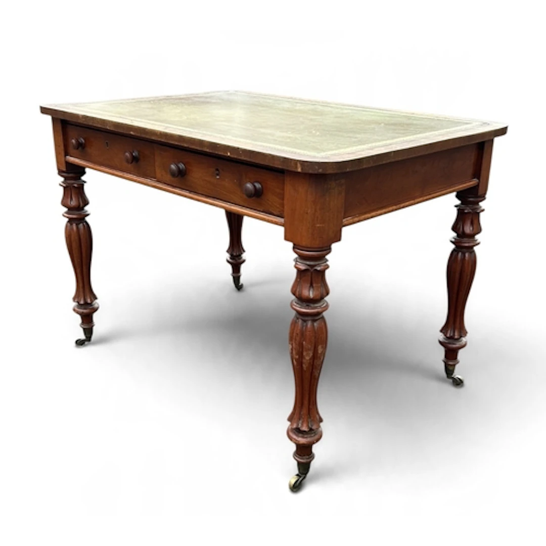 IN THE MANNER OF GILLOWS: A MAHOGANY WRITING TABLE WITH TOOL...