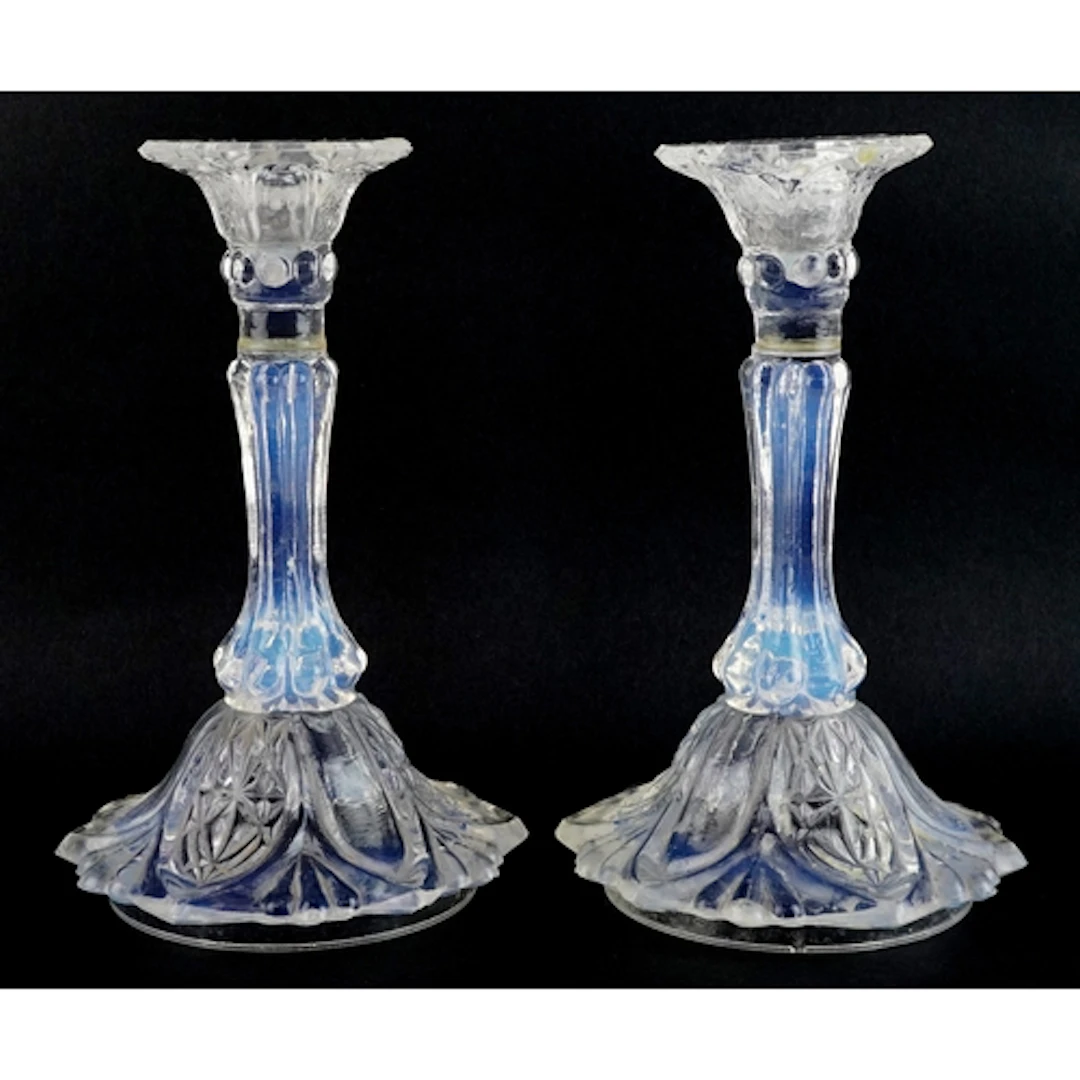 Pair of opaline glass candlesticks, each 18cm high.