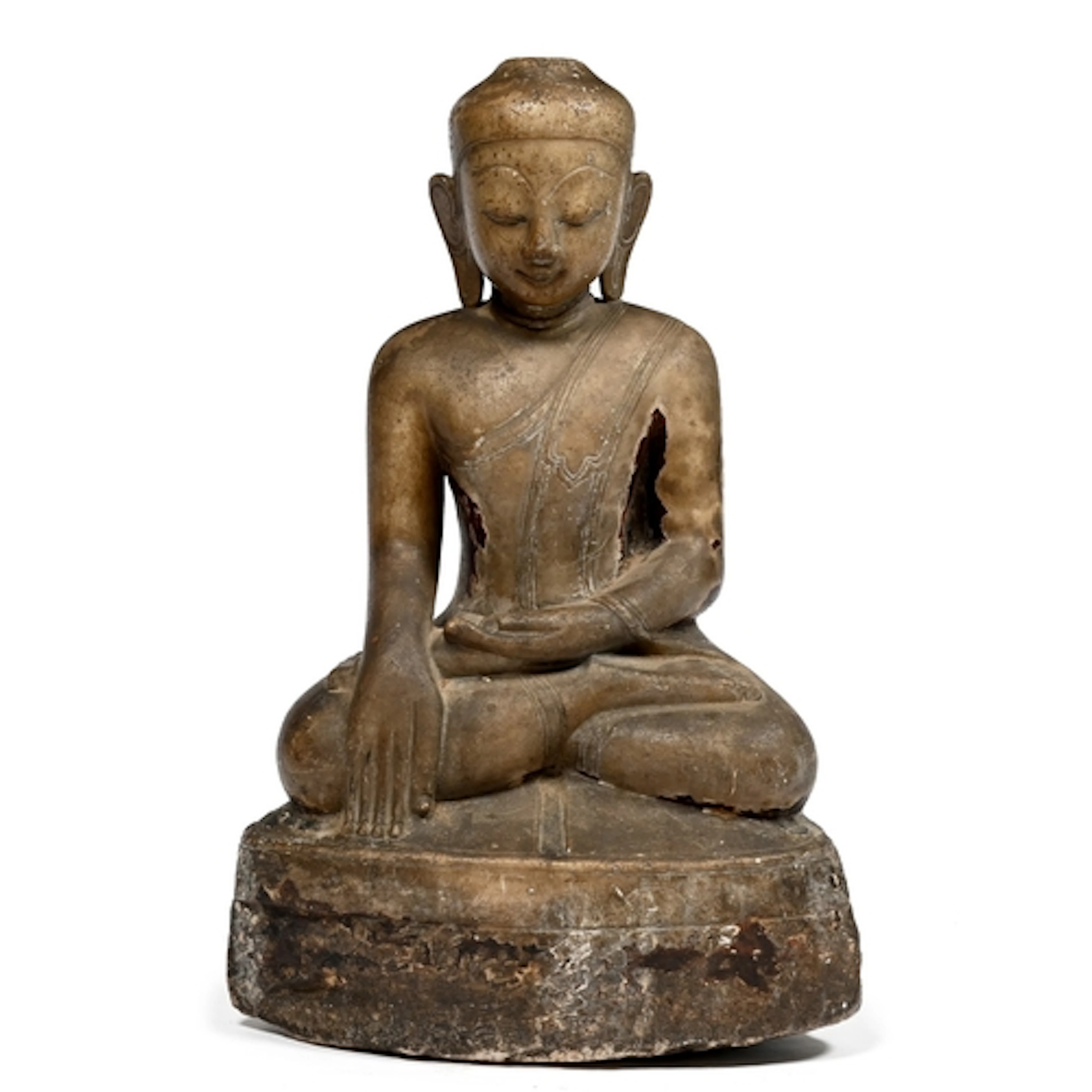 A Thai carved and glazed stone statue of a seated Buddha, Ay...