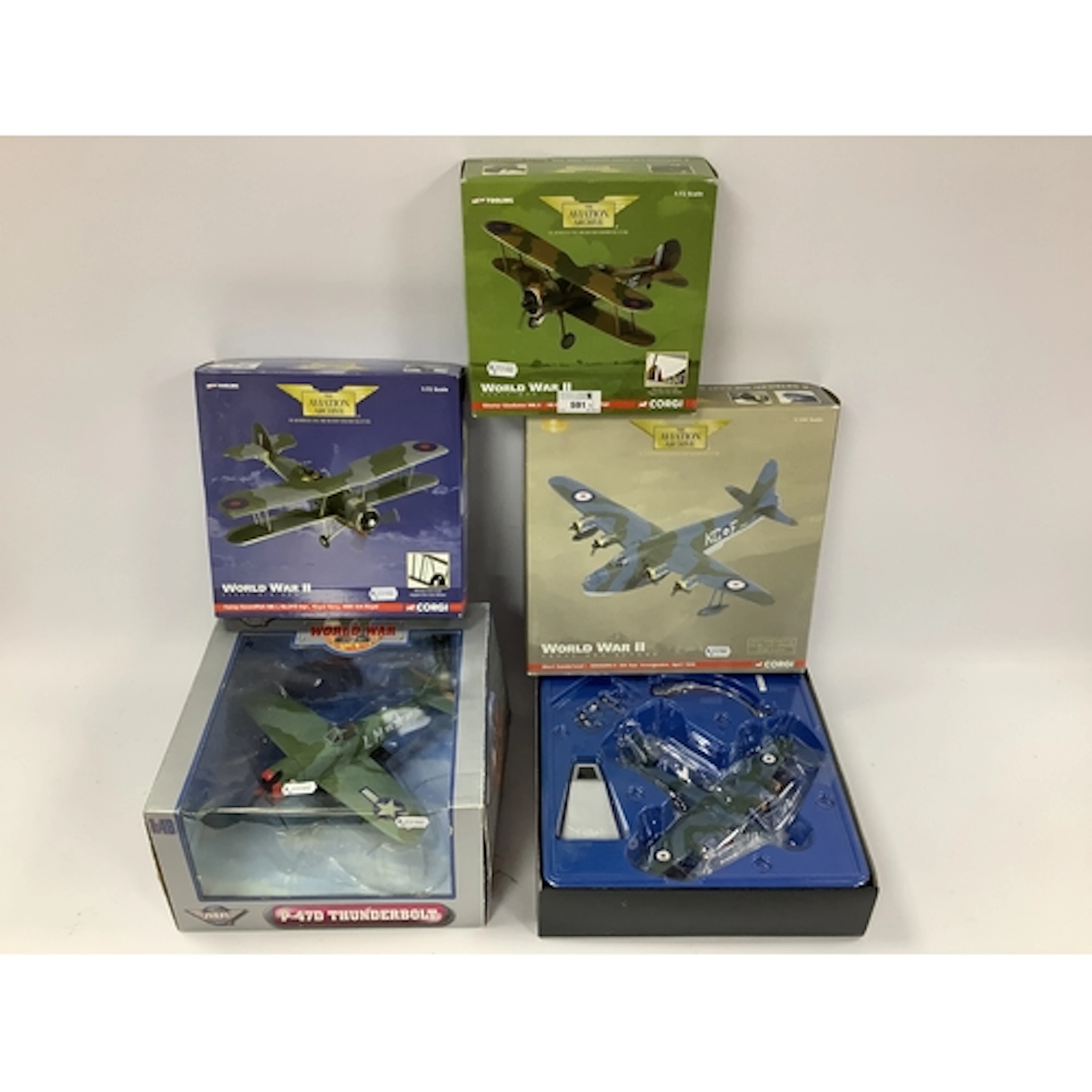 Four Diecast model WWII planes by Corgi and Yat Ming, to inc...