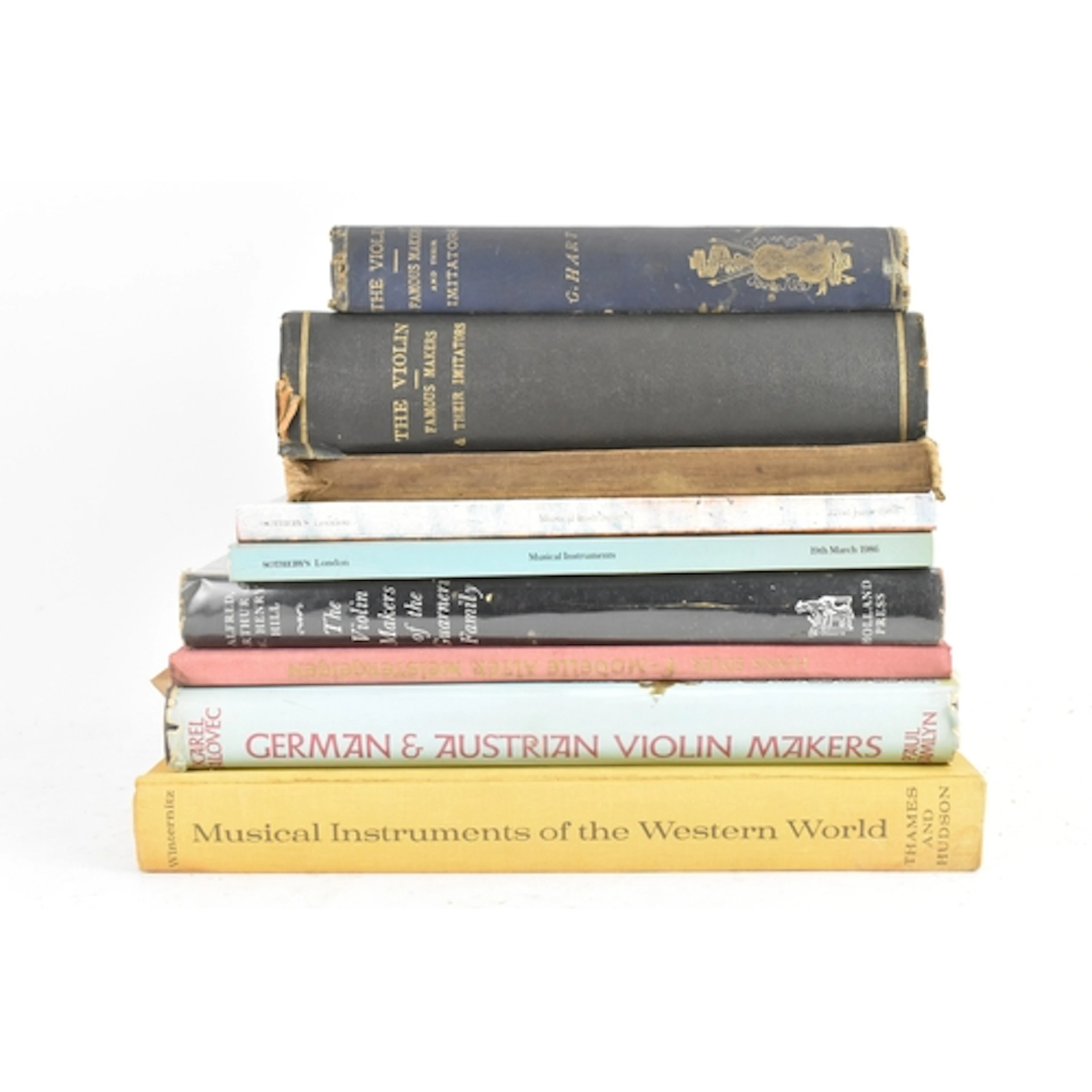 A collection of nine books and auction catalogues relating t...