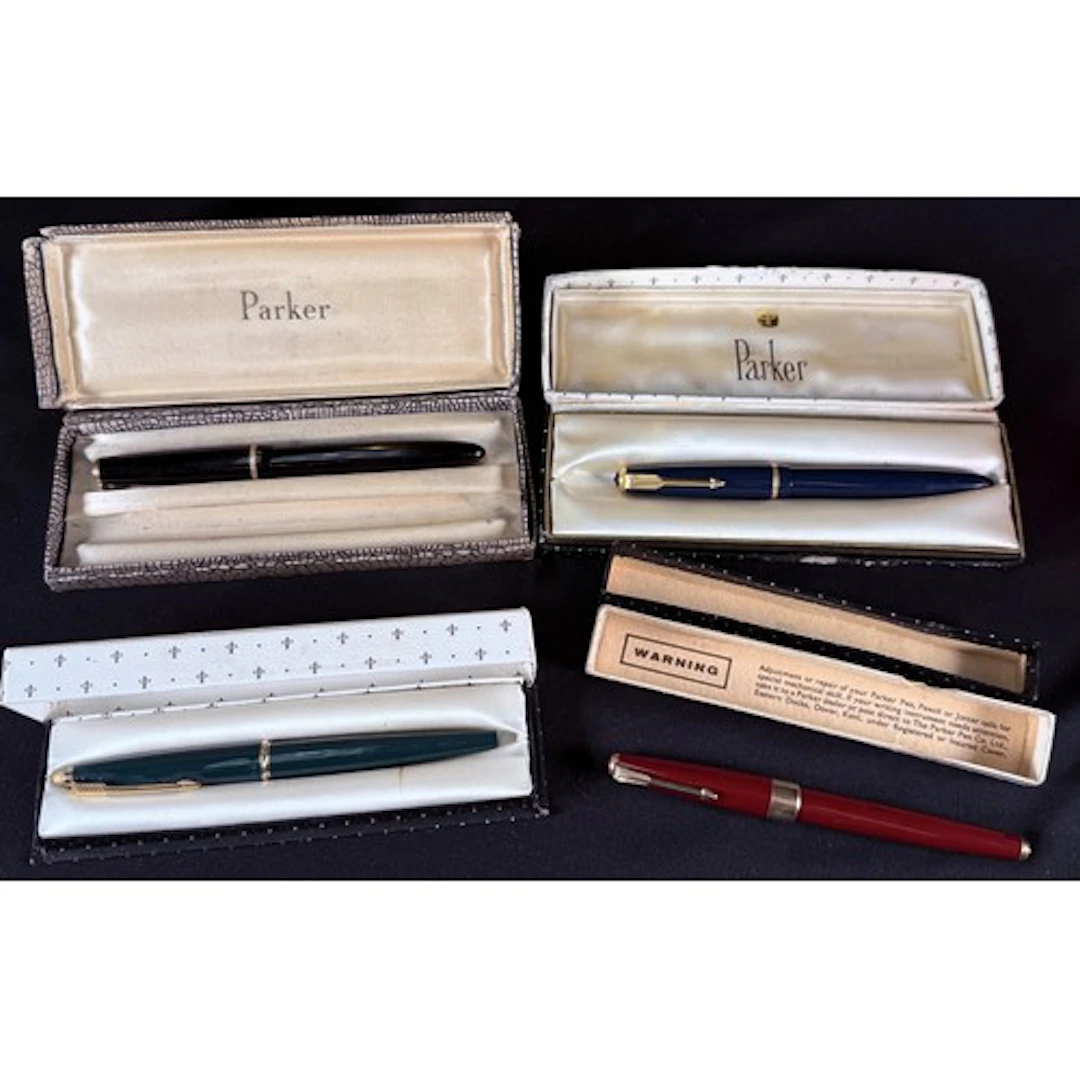 Four Parker Duofold fountain pens, in original boxes, 14k ni...