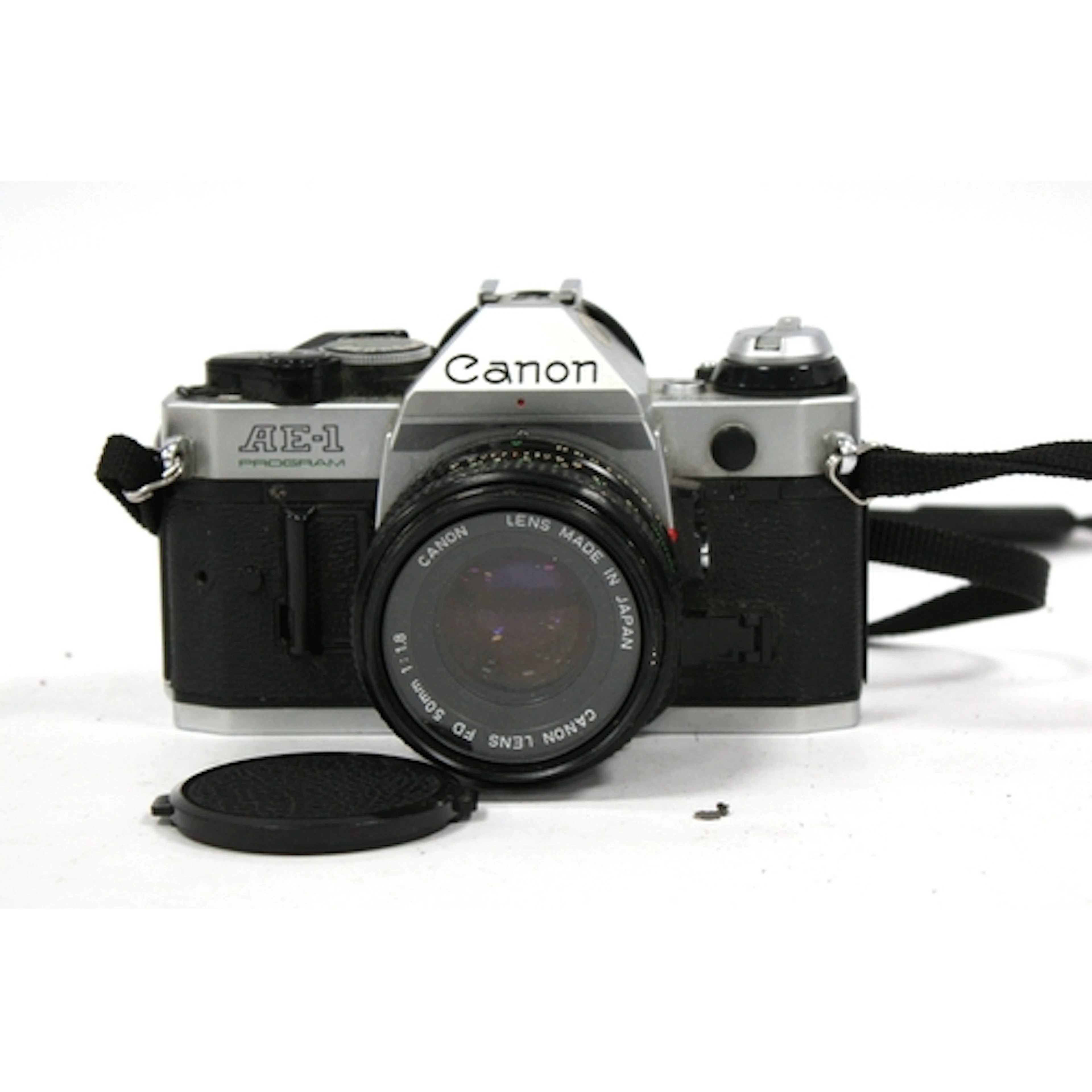 Canon AE-1 Program 35mm SLR Film Camera with attached FD 50m...