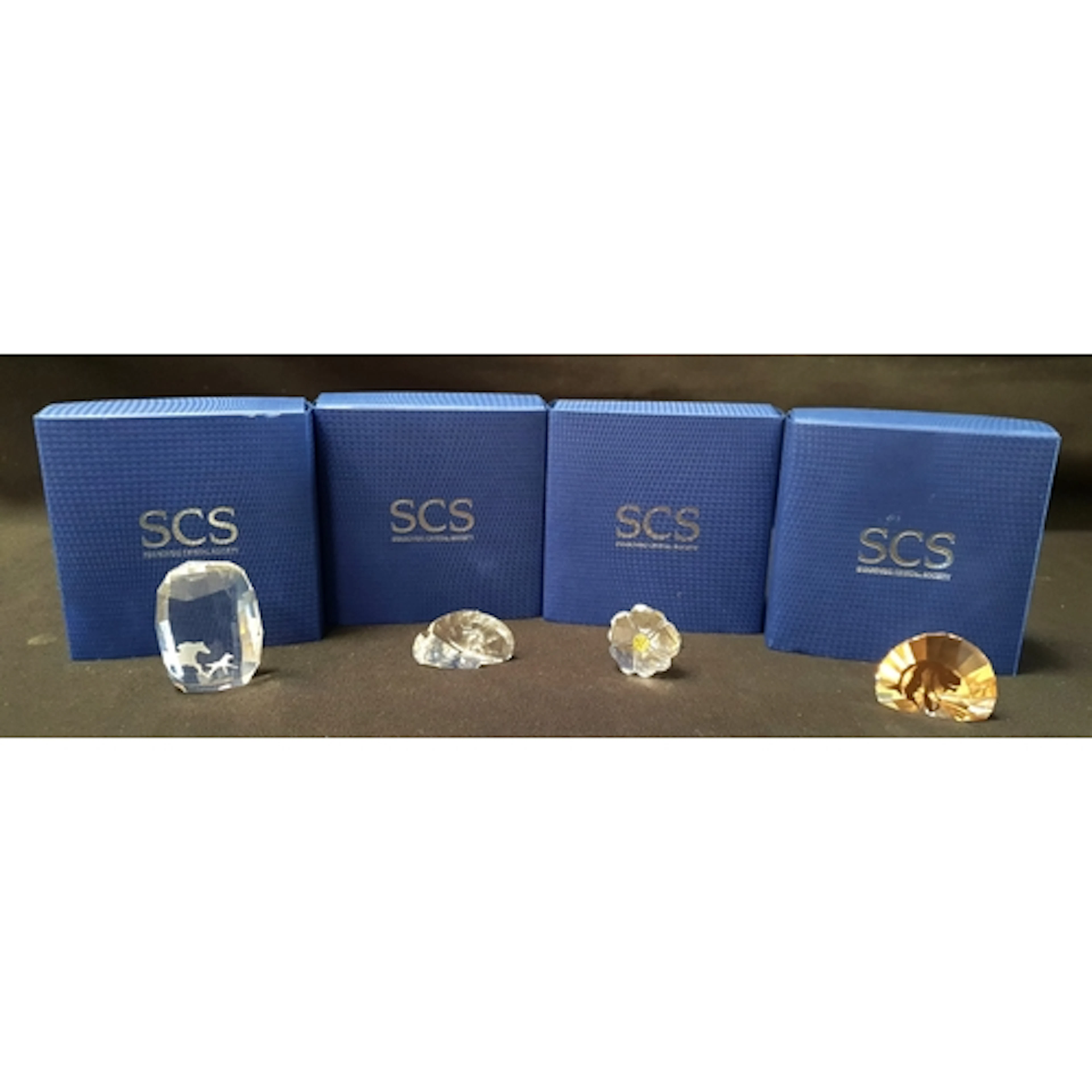 SELECTION OF FOUR SWAROVSKI PAPER WEIGHTS compromising 'SCS ...