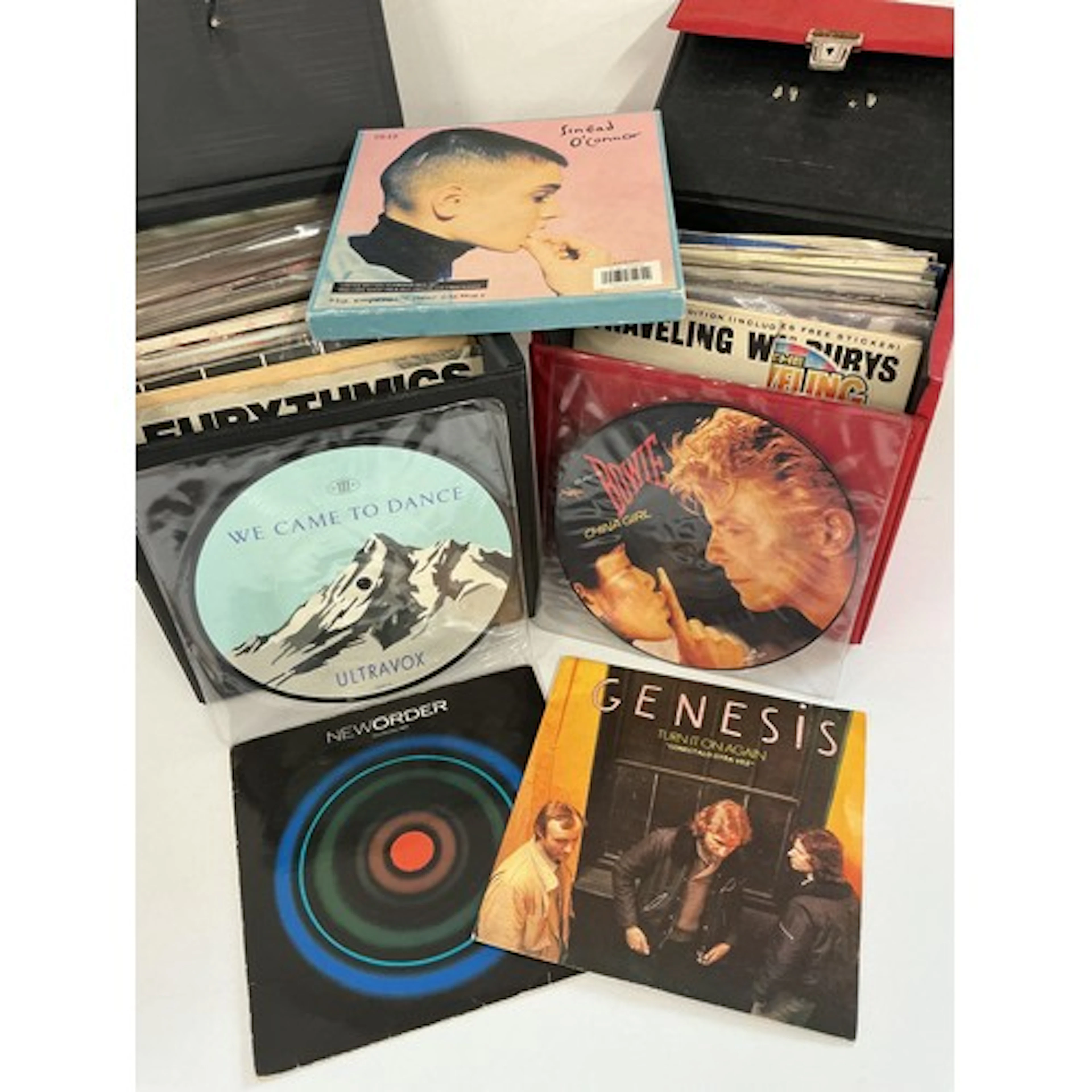 Two record cases of 7” singles, mainly 1980s artists, includ...