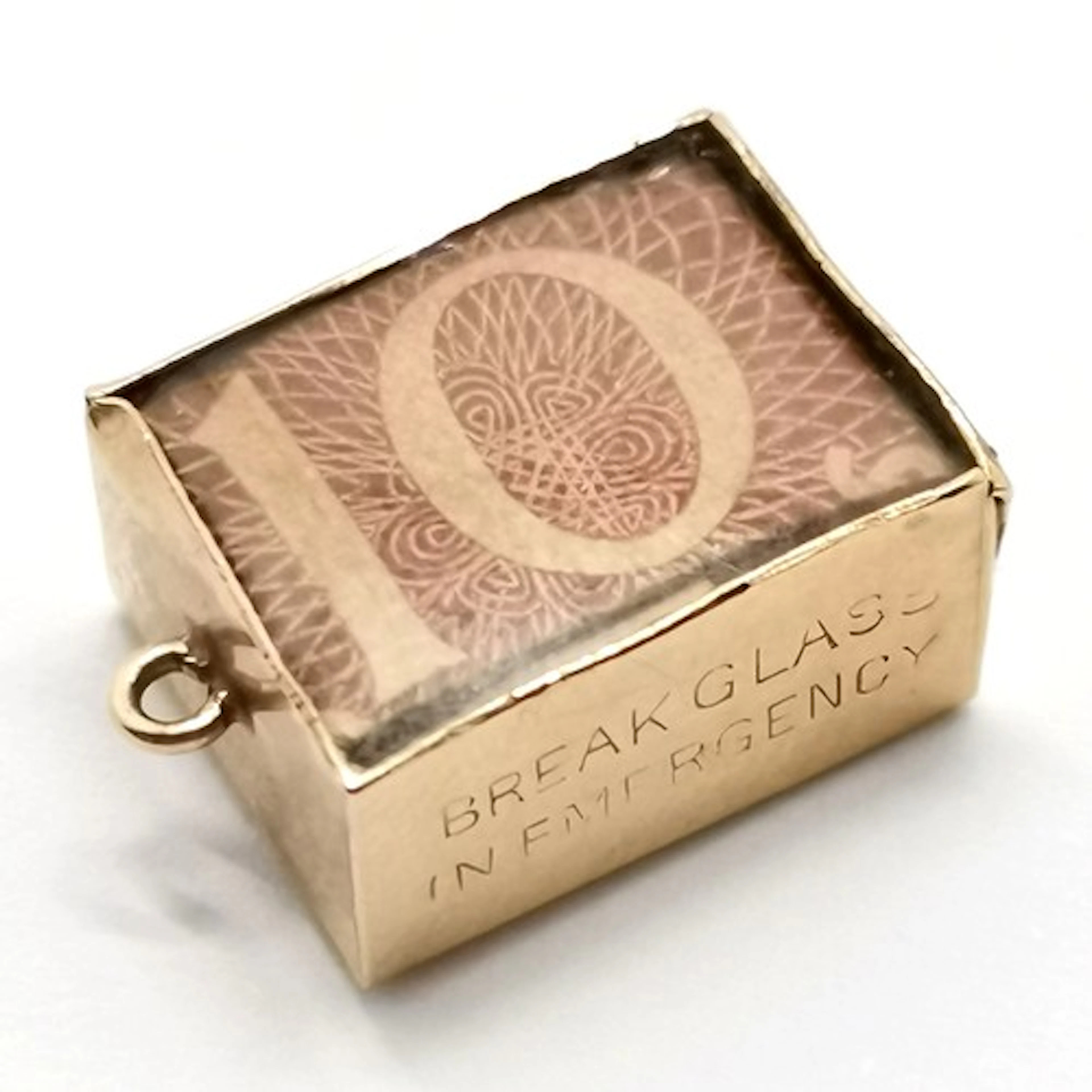 9ct hallmarked gold 'Break glass in emergency' 10/- banknote...