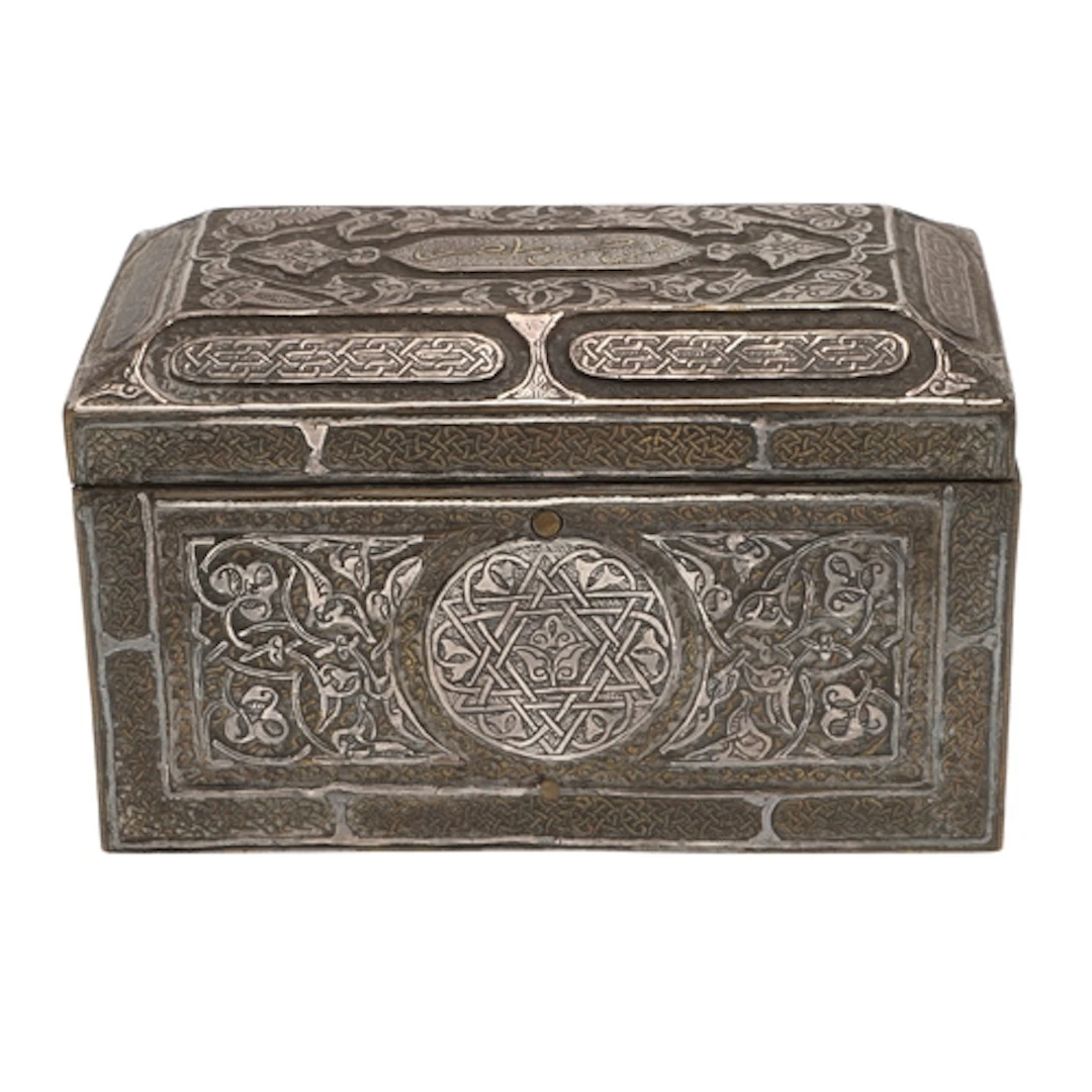 AN ISLAMIC BRASS BOX. wood lined, chased brass and silver wi...