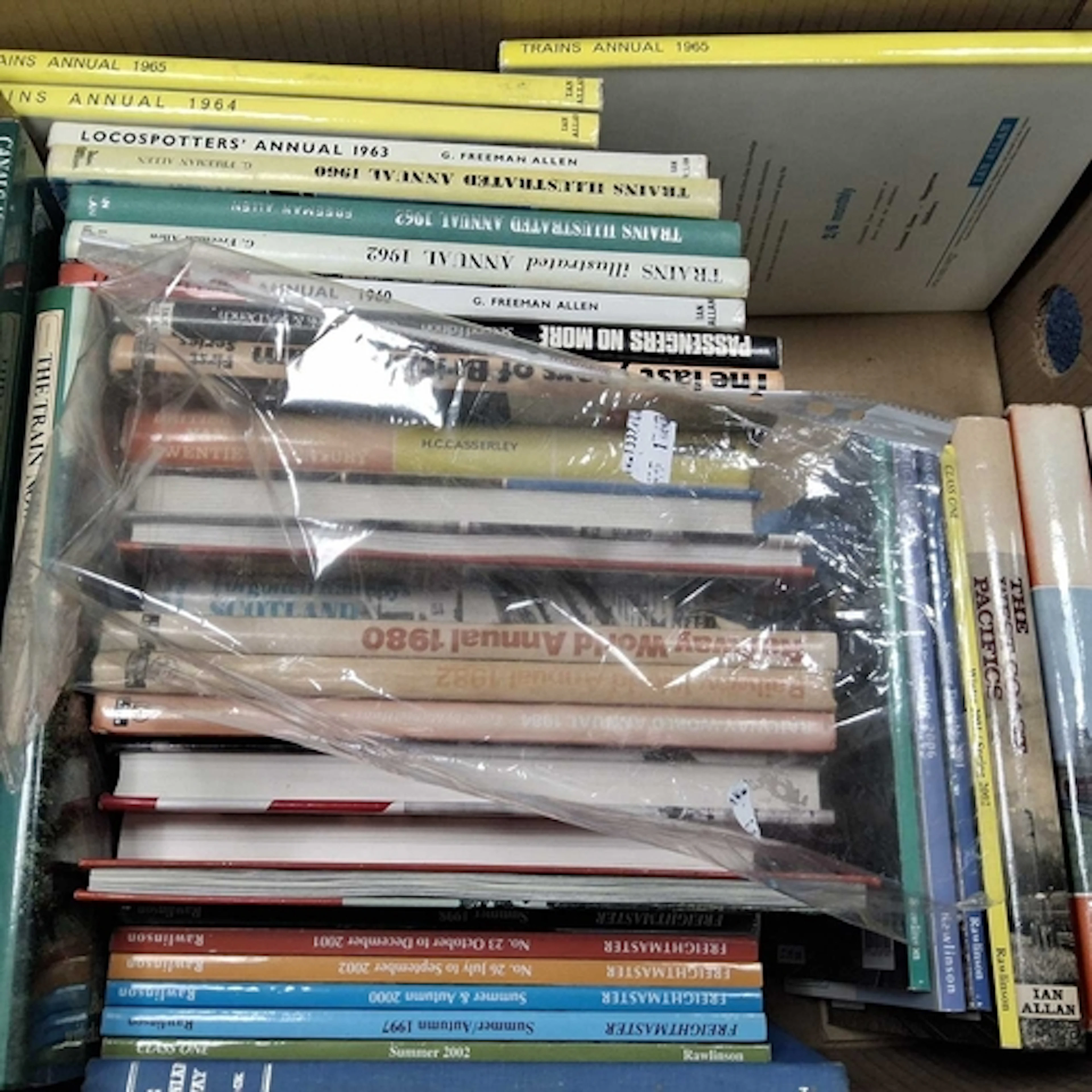 FOUR BOXES OF RAILWAY BOOKS to include approximately one hun...