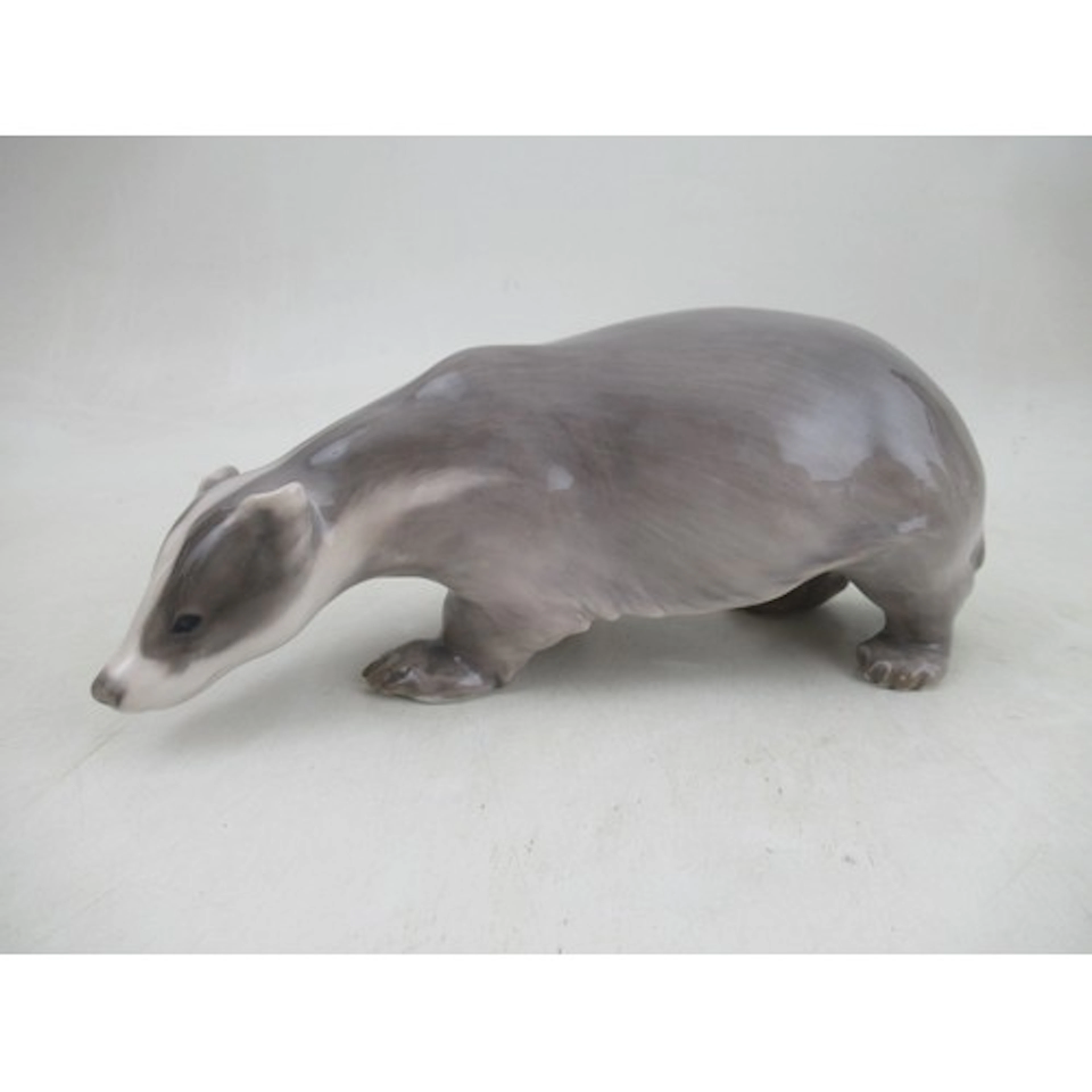 A Royal Copenhagen large and rare model, of a badger, No. 12...