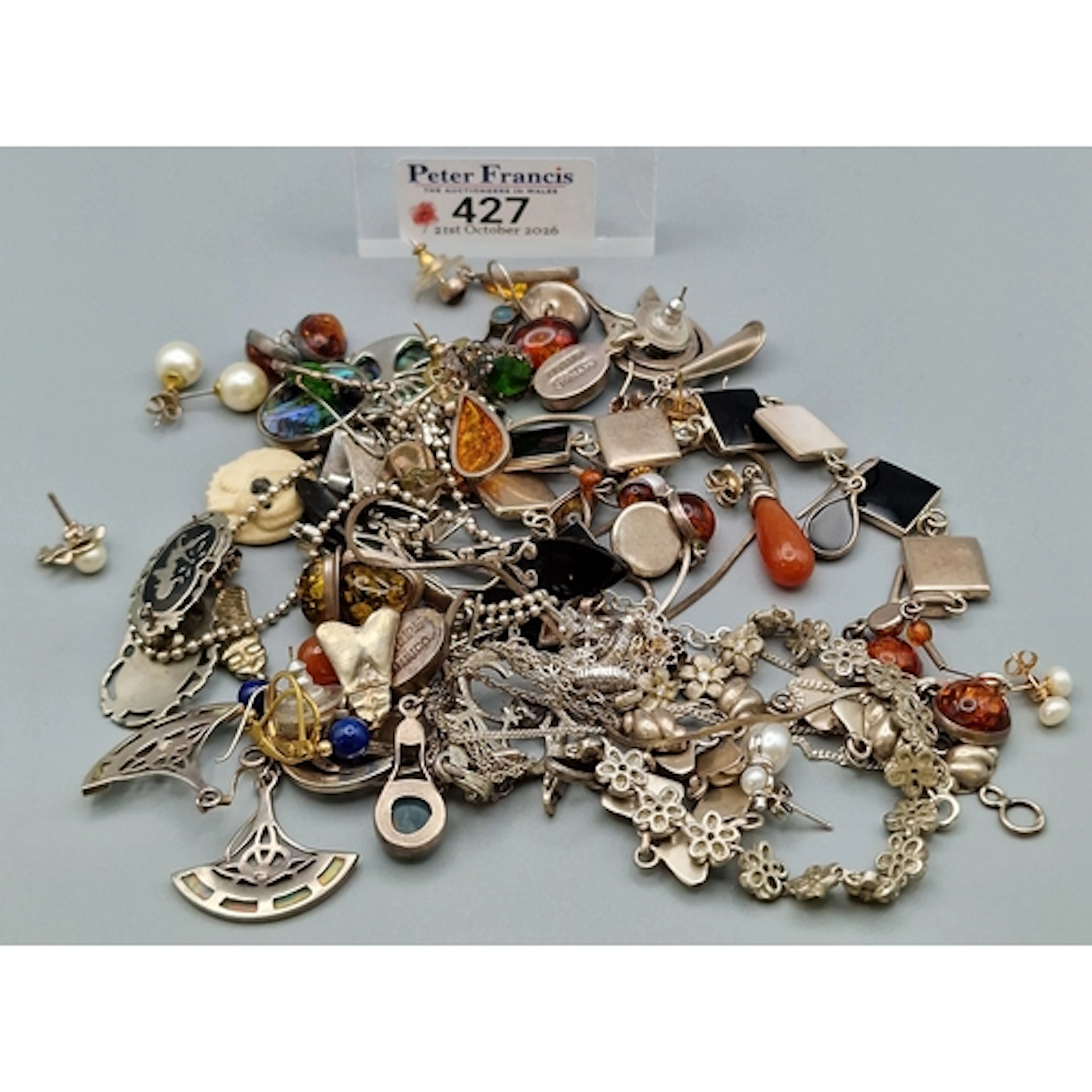 Bag of silver and other jewellery set with semi-precious sto...