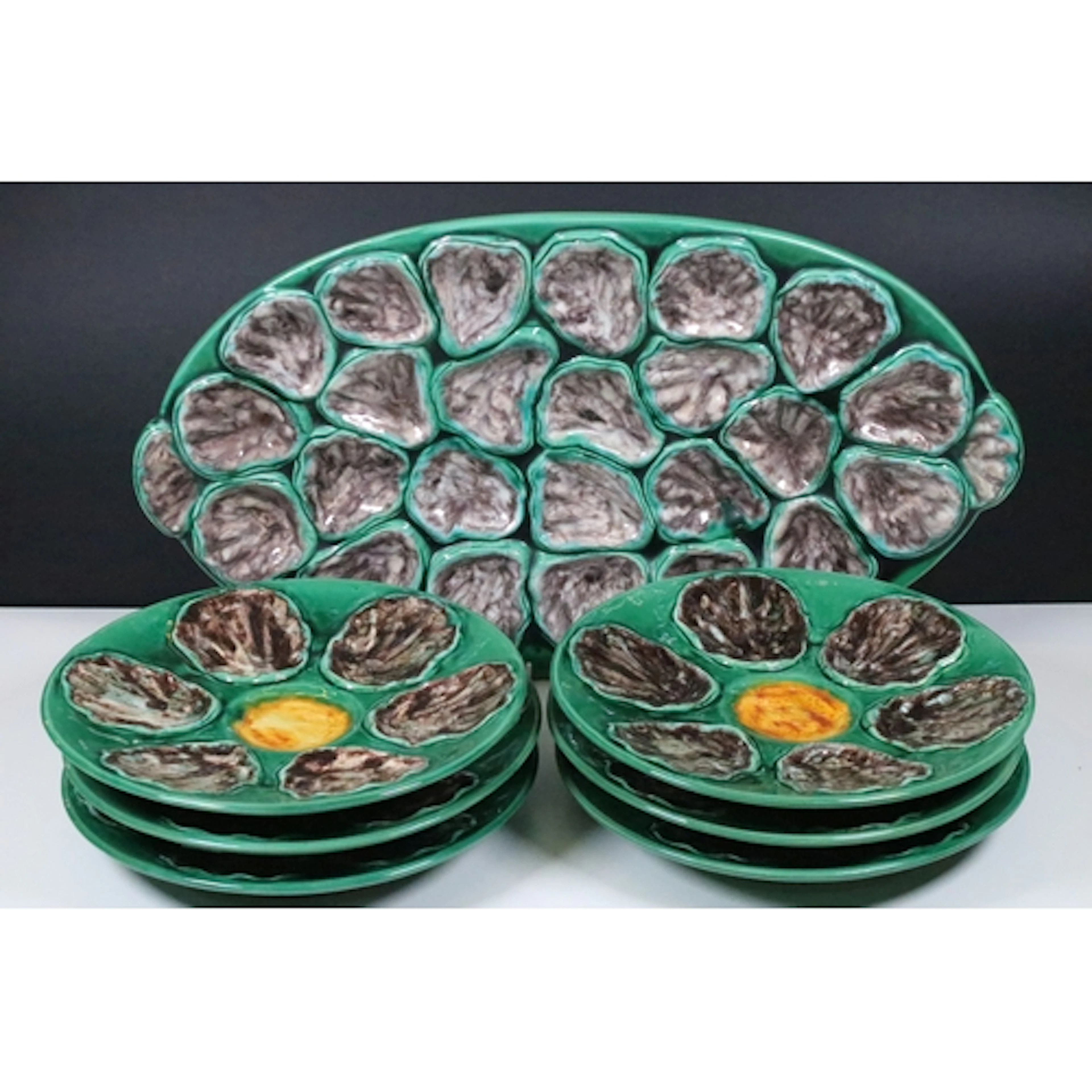 Set of six 20th century oyster plates, having green ground w...