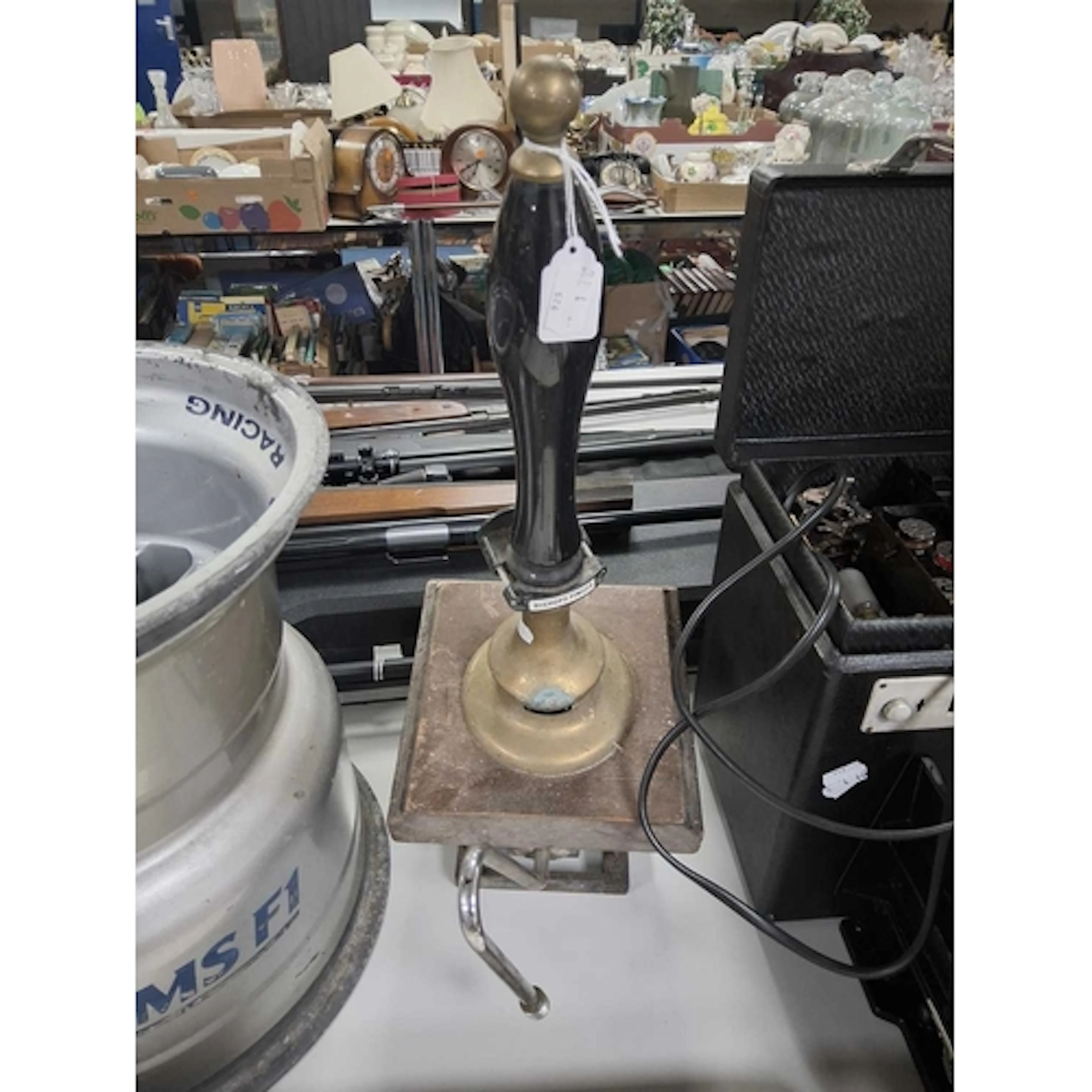 A TRADITIONAL BAR HAND PULLED ALE PUMP with black pump handl...