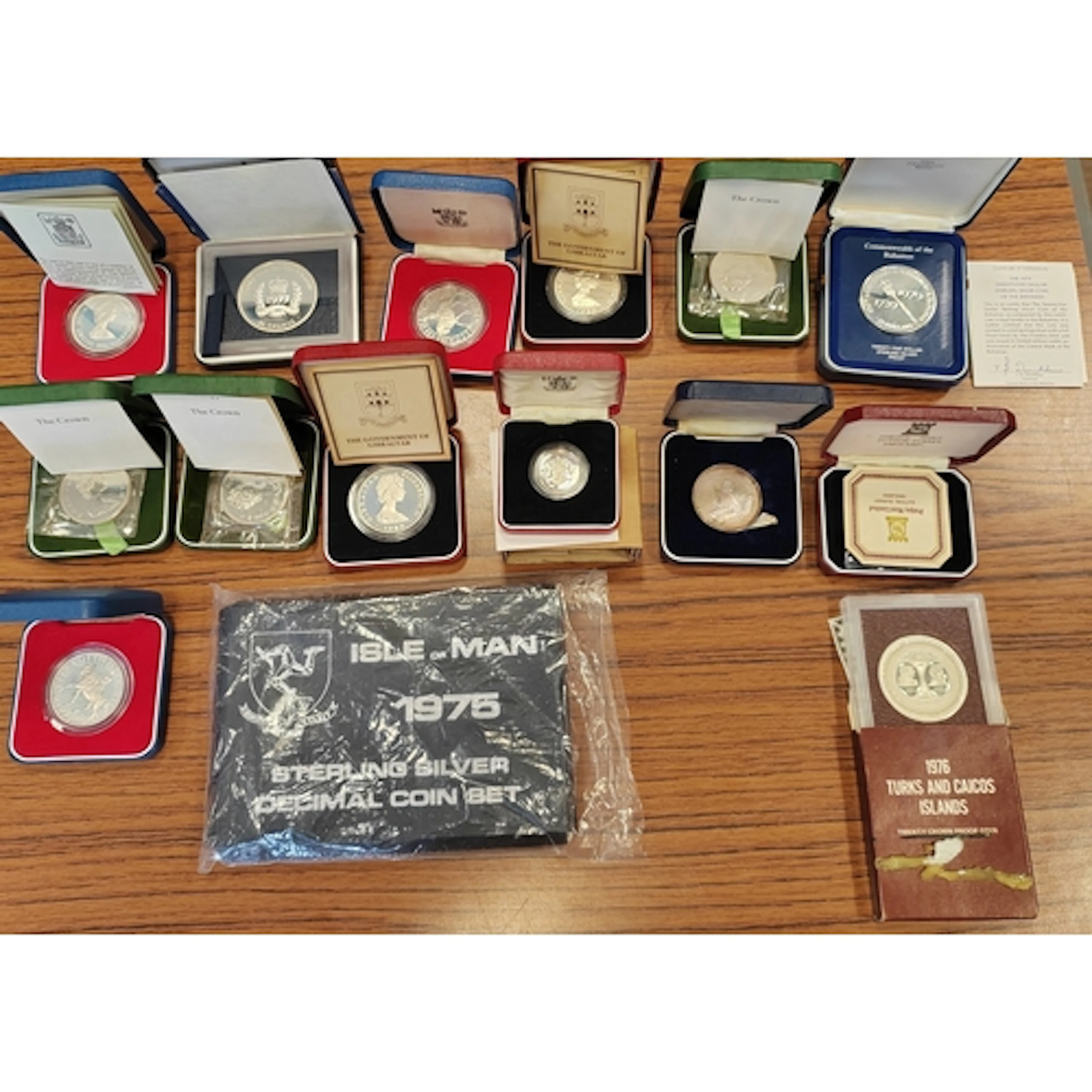 Collection of boxed silver proofs with certificates with Bah...