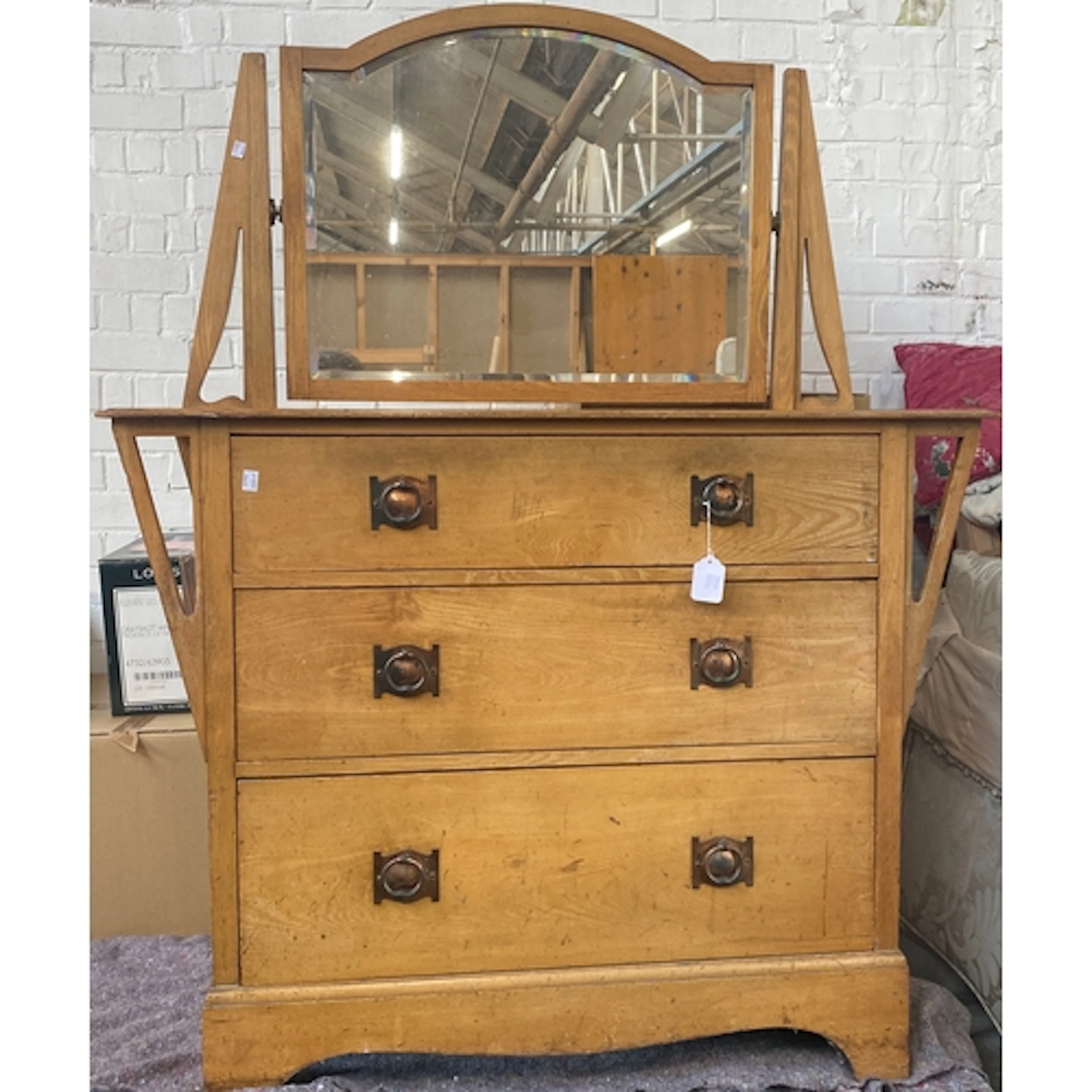 An early 20th century Art Nouveau ash dressing table with ad...
