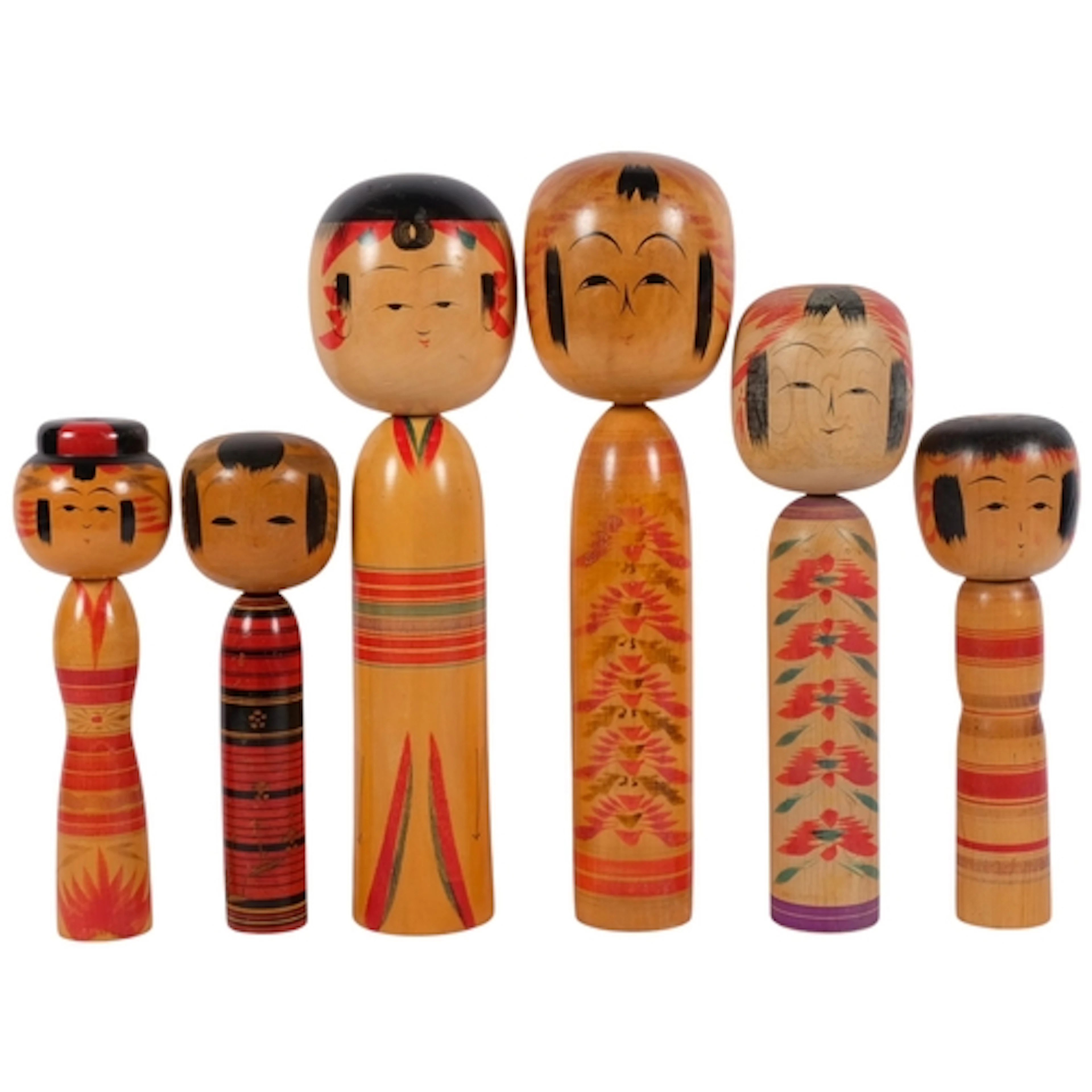 A group of 6 hand-painted Japanese Kokeshi dolls, tallest H3...