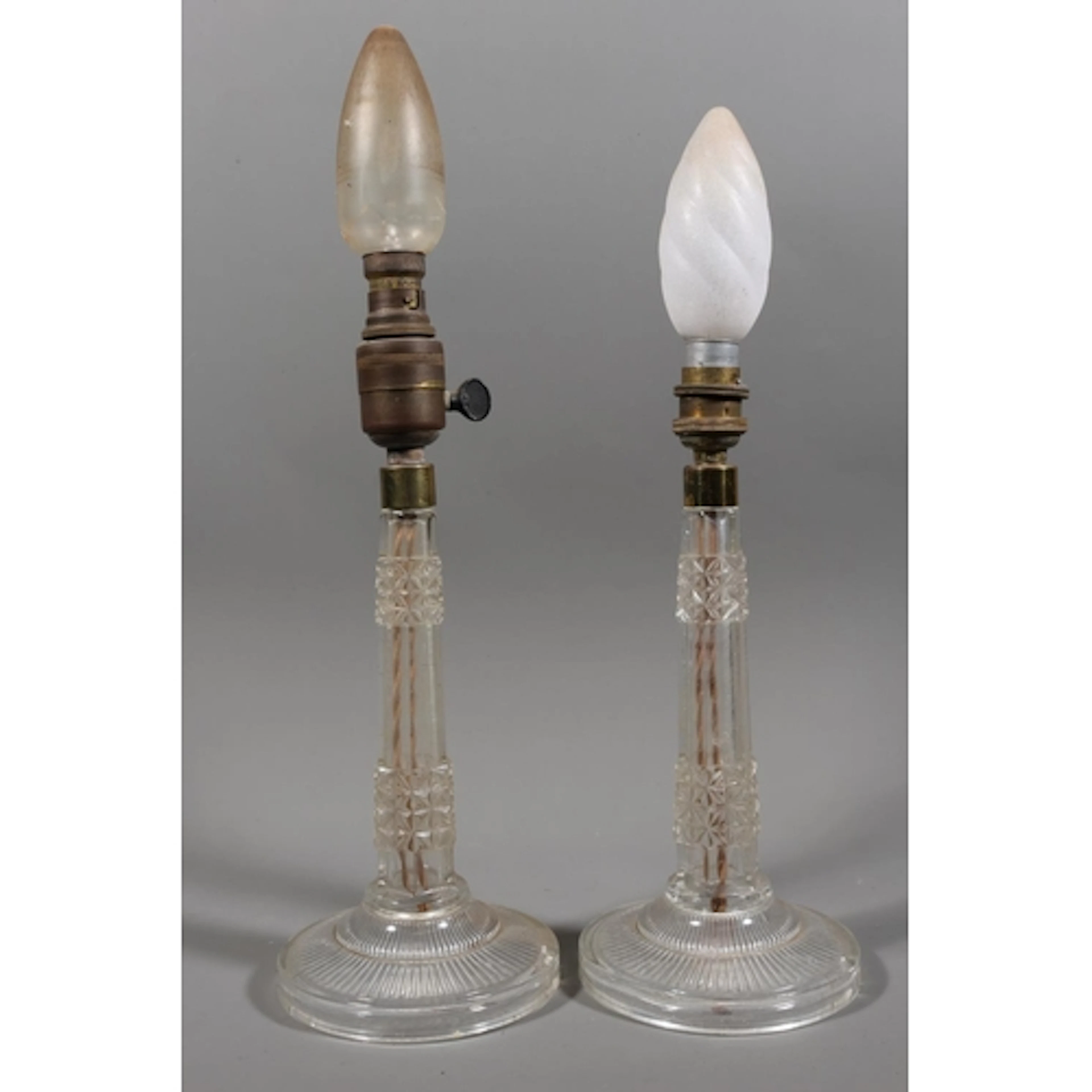 Pair of glass table lamps with hexagonal tapering columns an...