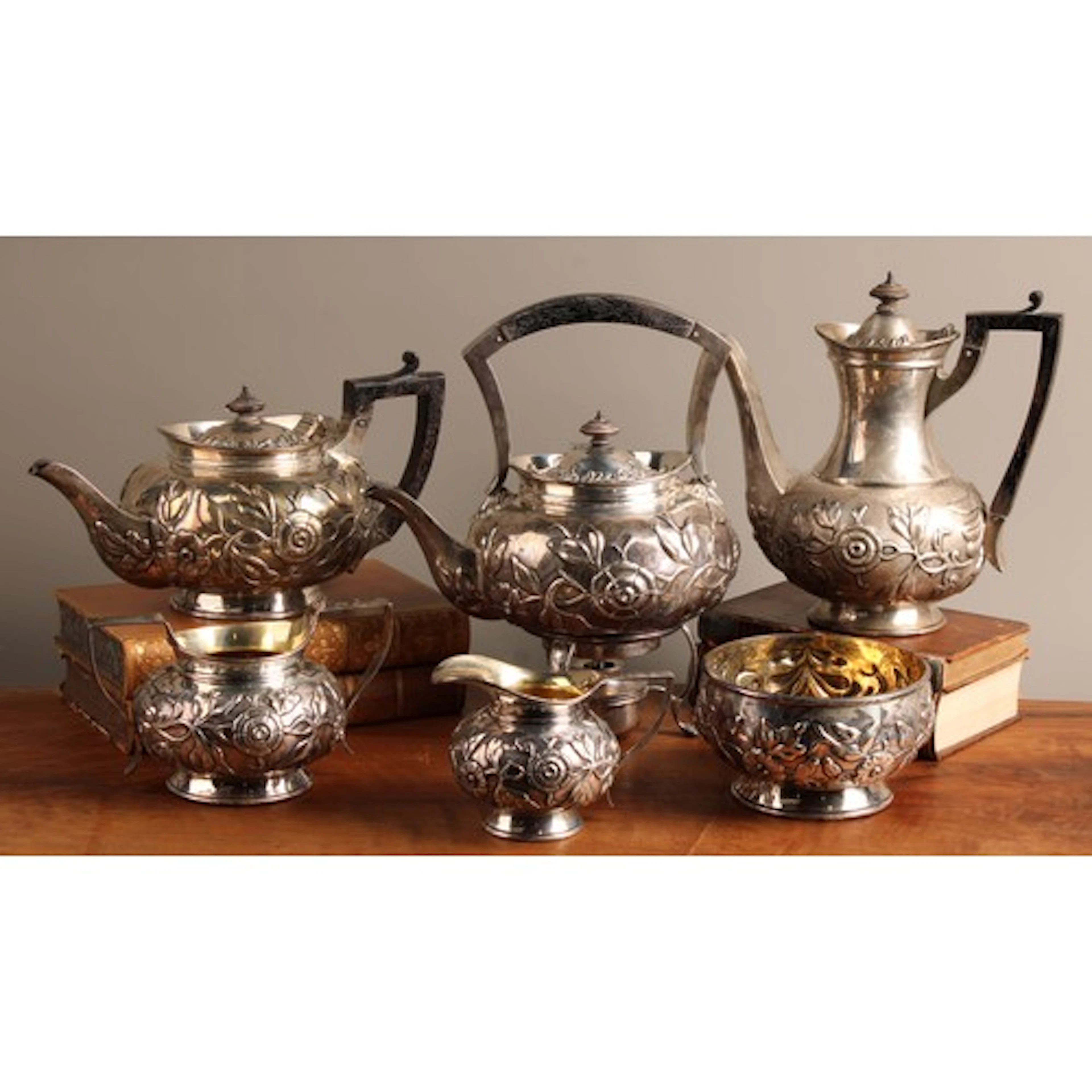 An Edwardian silver six piece tea service, comprising teapot...
