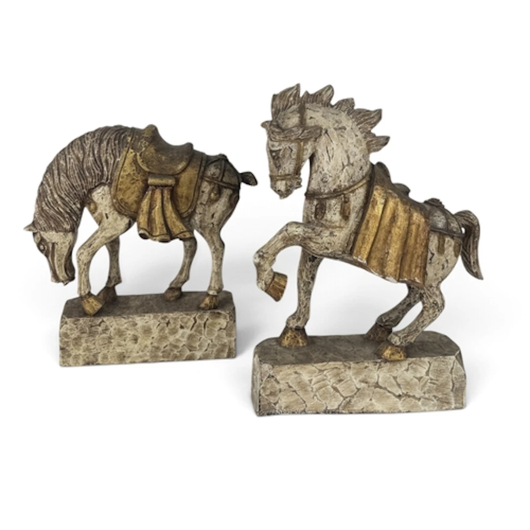 A PAIR OF CHINESE PAINTED AND GILDED WOOD TANG STYLE HORSES ...