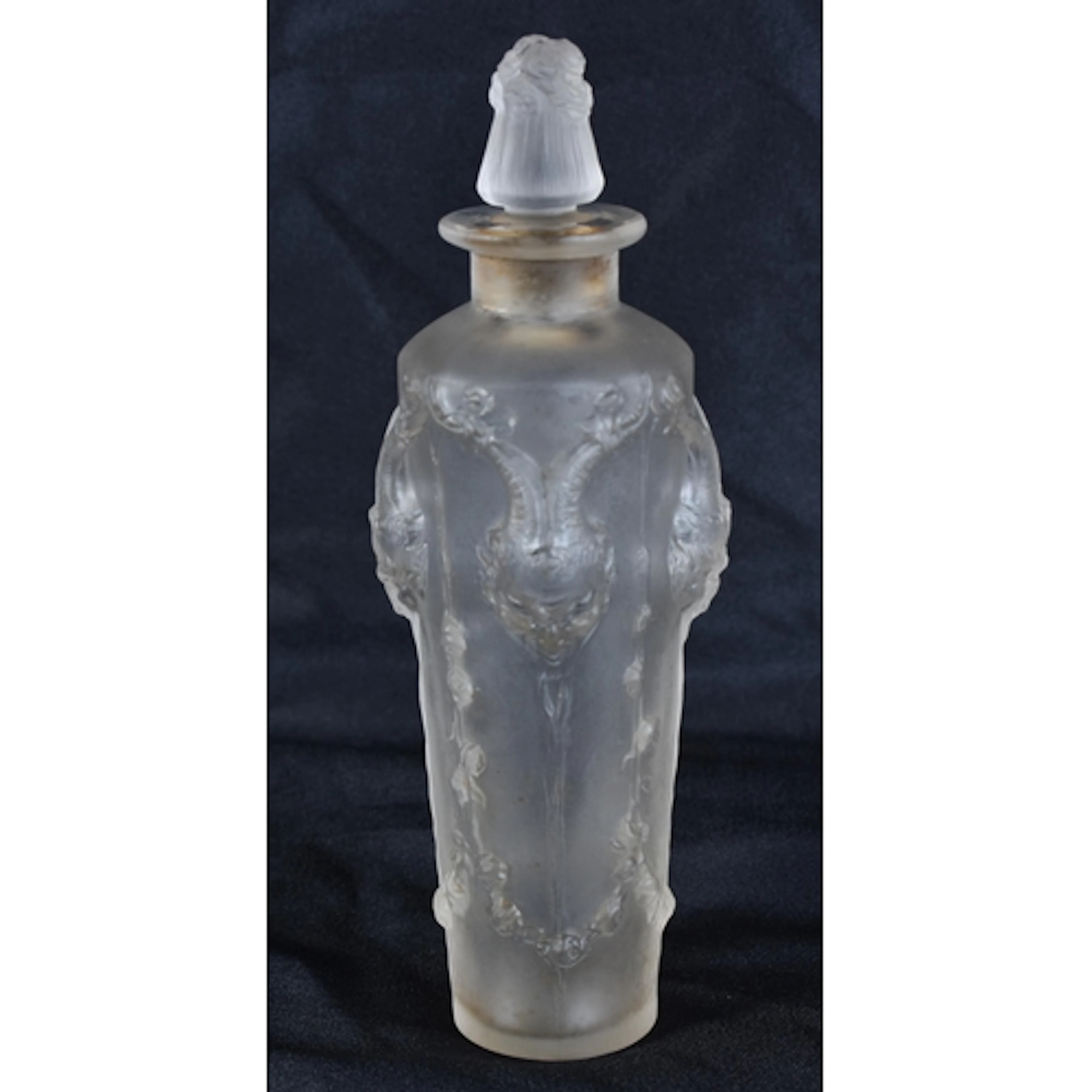 RENE LALIQUE A FROSTED GLASS 'PAN' PERFUME BOTTLE AND STOPPE...