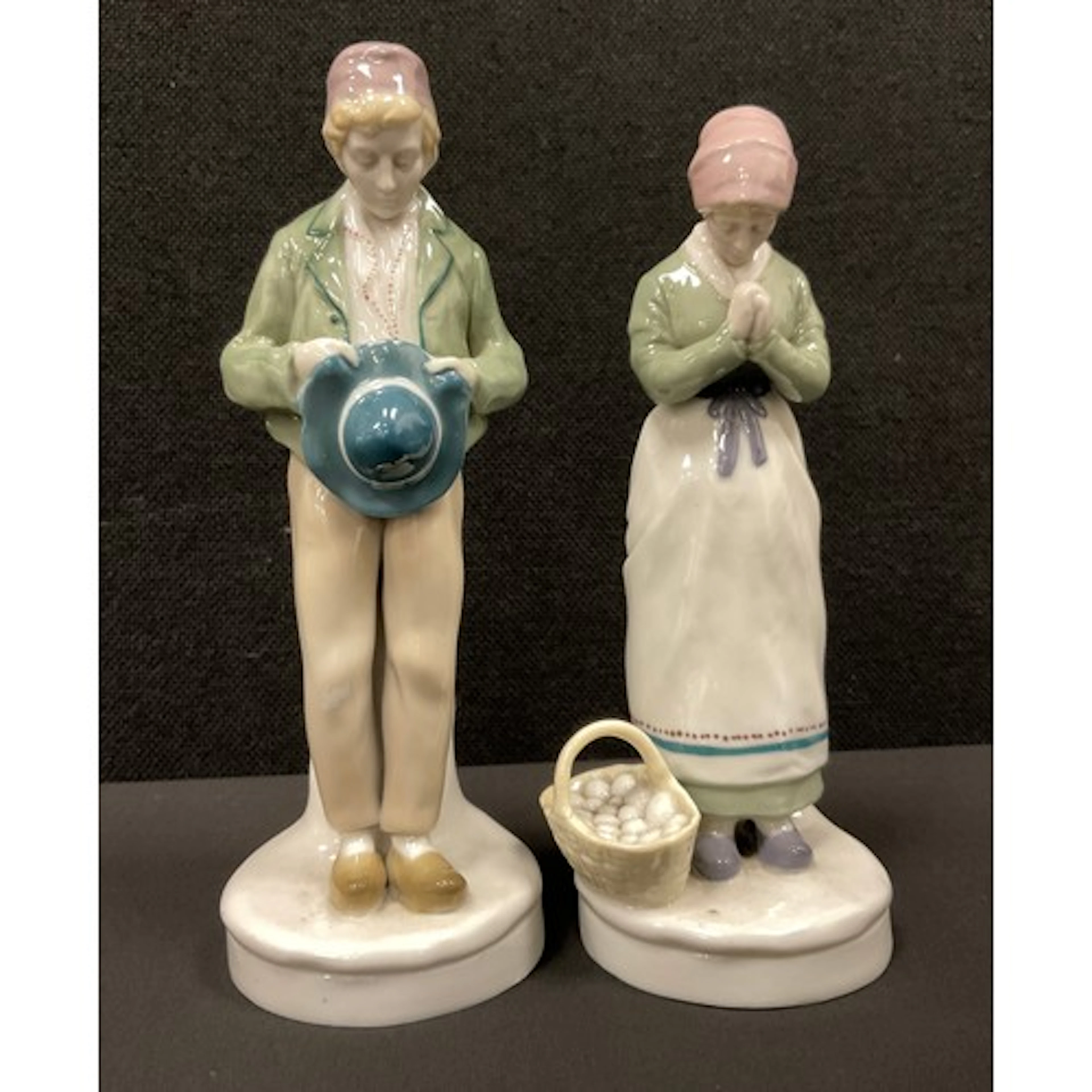 A pair of Oeslau William Goebel porcelain figures, farm girl...