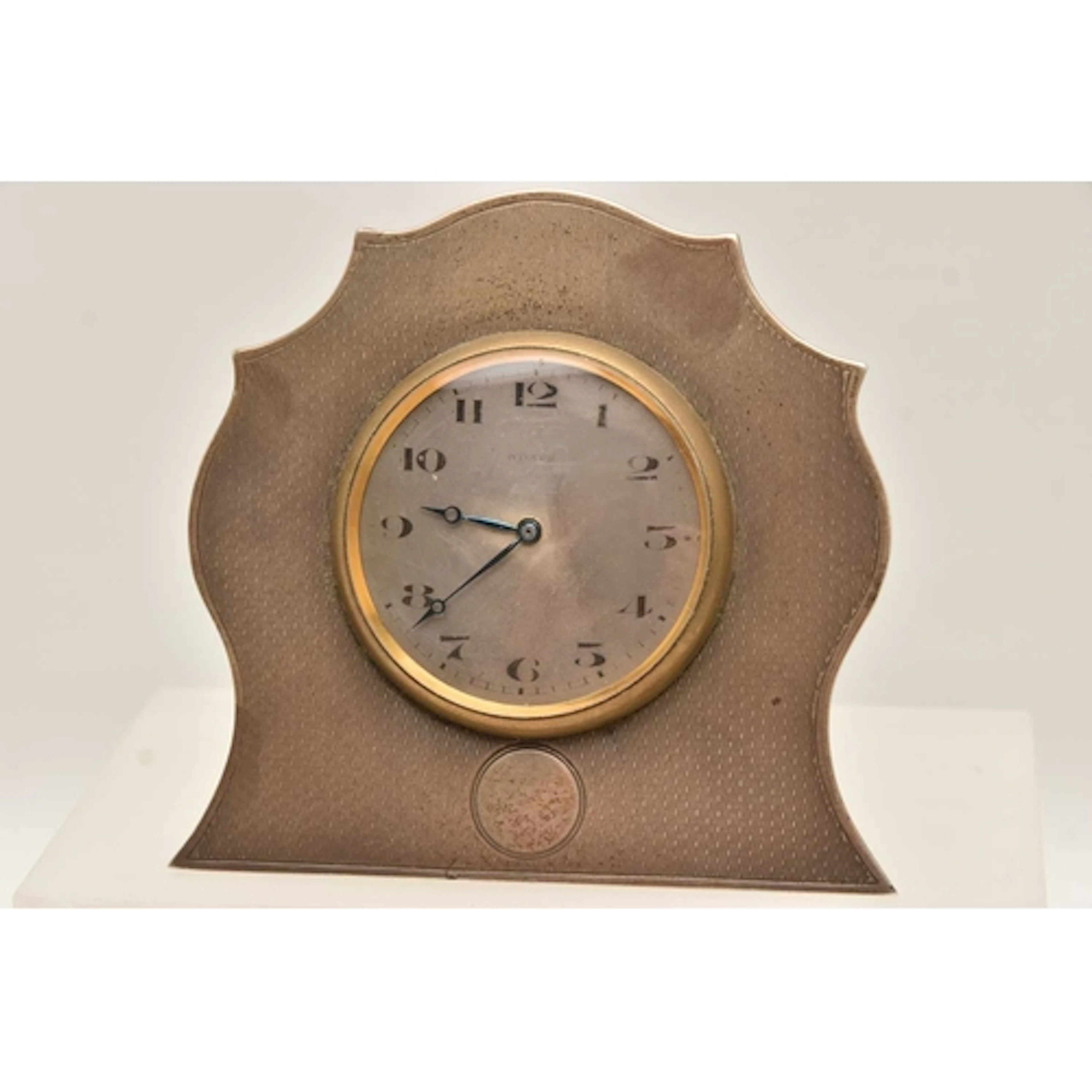 A SILVER FRONTED MANTLE CLOCK, hand wound movement, round di...
