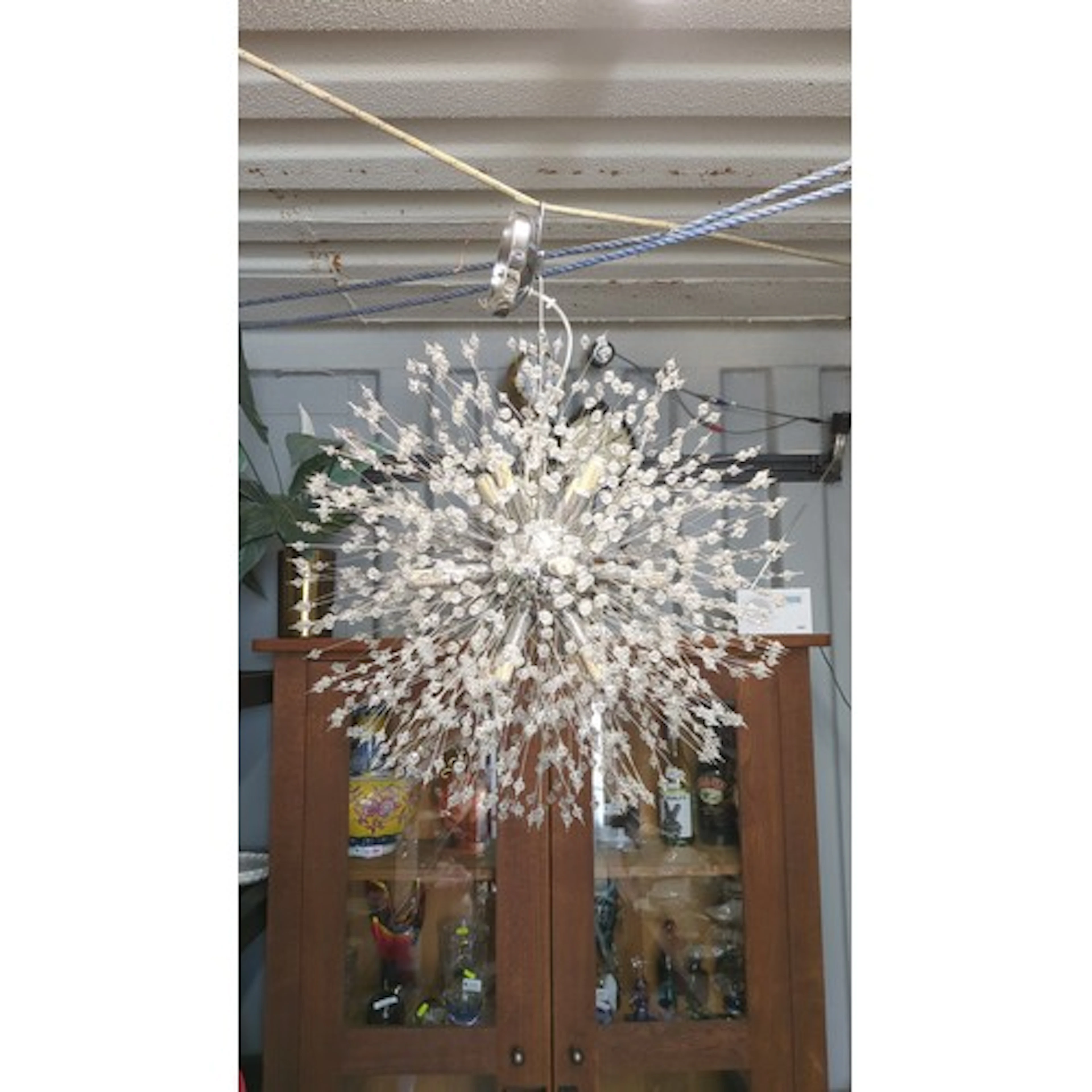Chrome and acrylic sputnik style pendant light, the spherica...