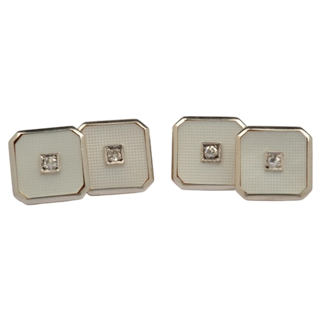 A pair of Art Deco mother of pearl and diamond cufflinks, ea...