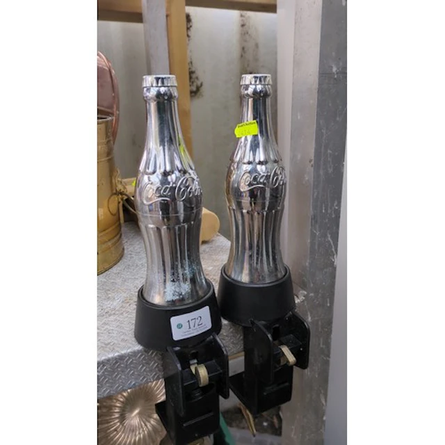 A pair of Coca-Cola bottle-form advertising fixtures/bottle ...