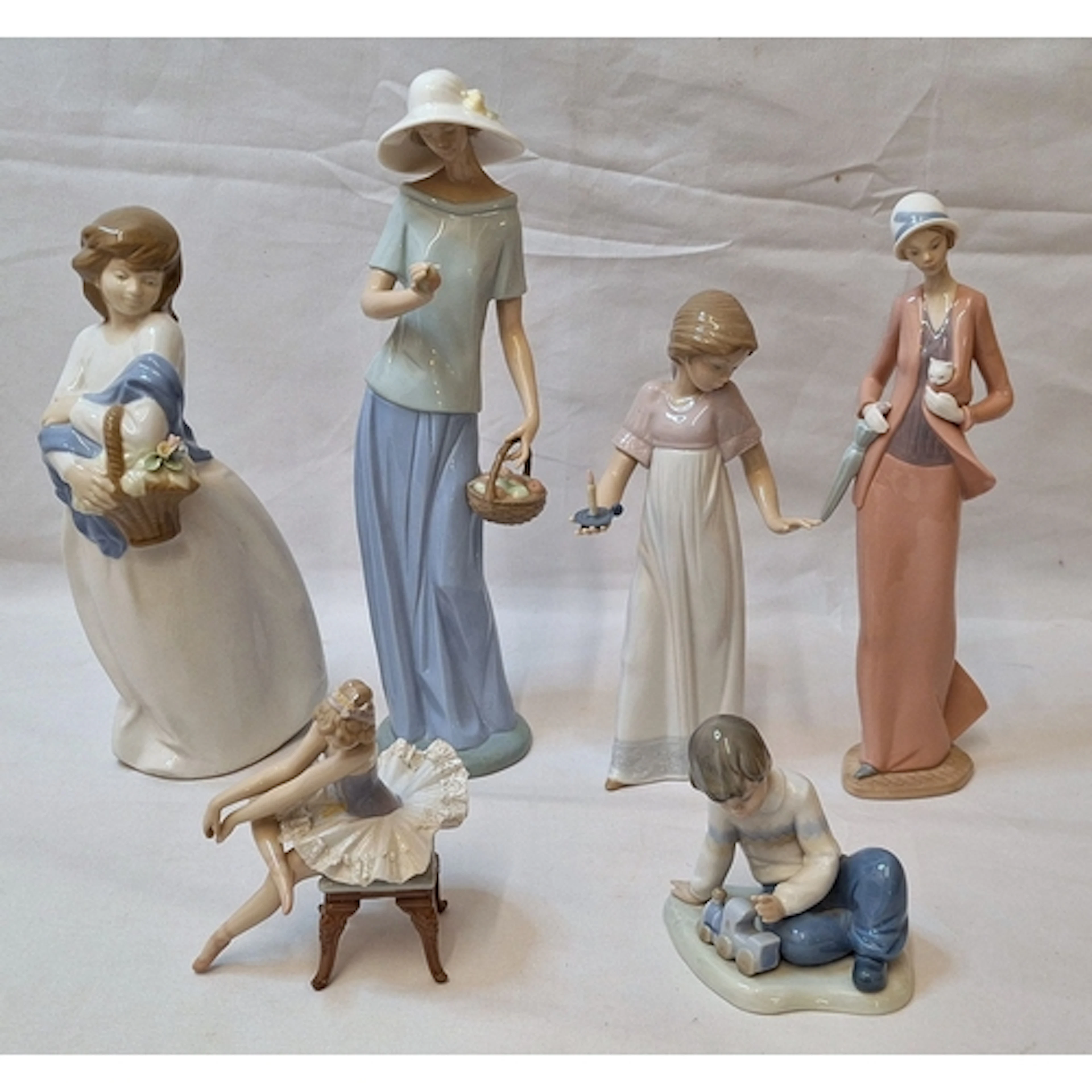 Ceramic Figurines, mostly Nao, Lladro seated ballerina A/f, ...