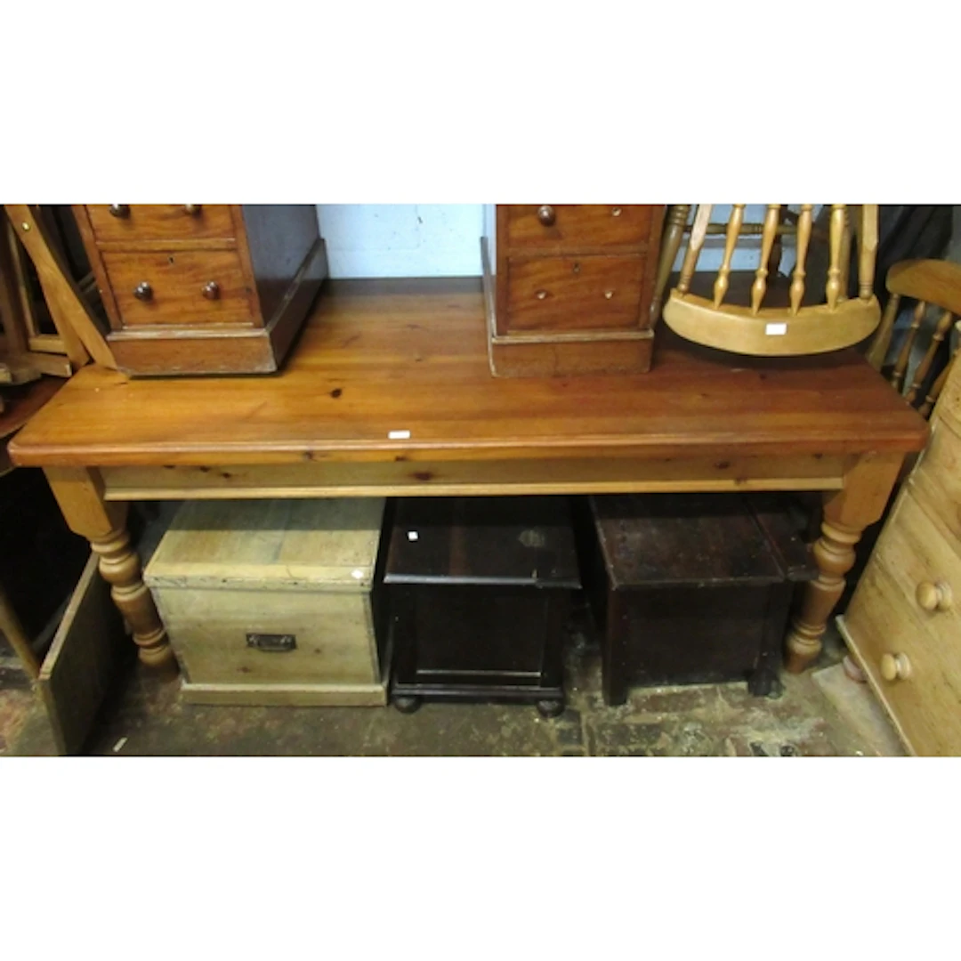 Modern pine farmhouse table, with moulded top, on turned sup...