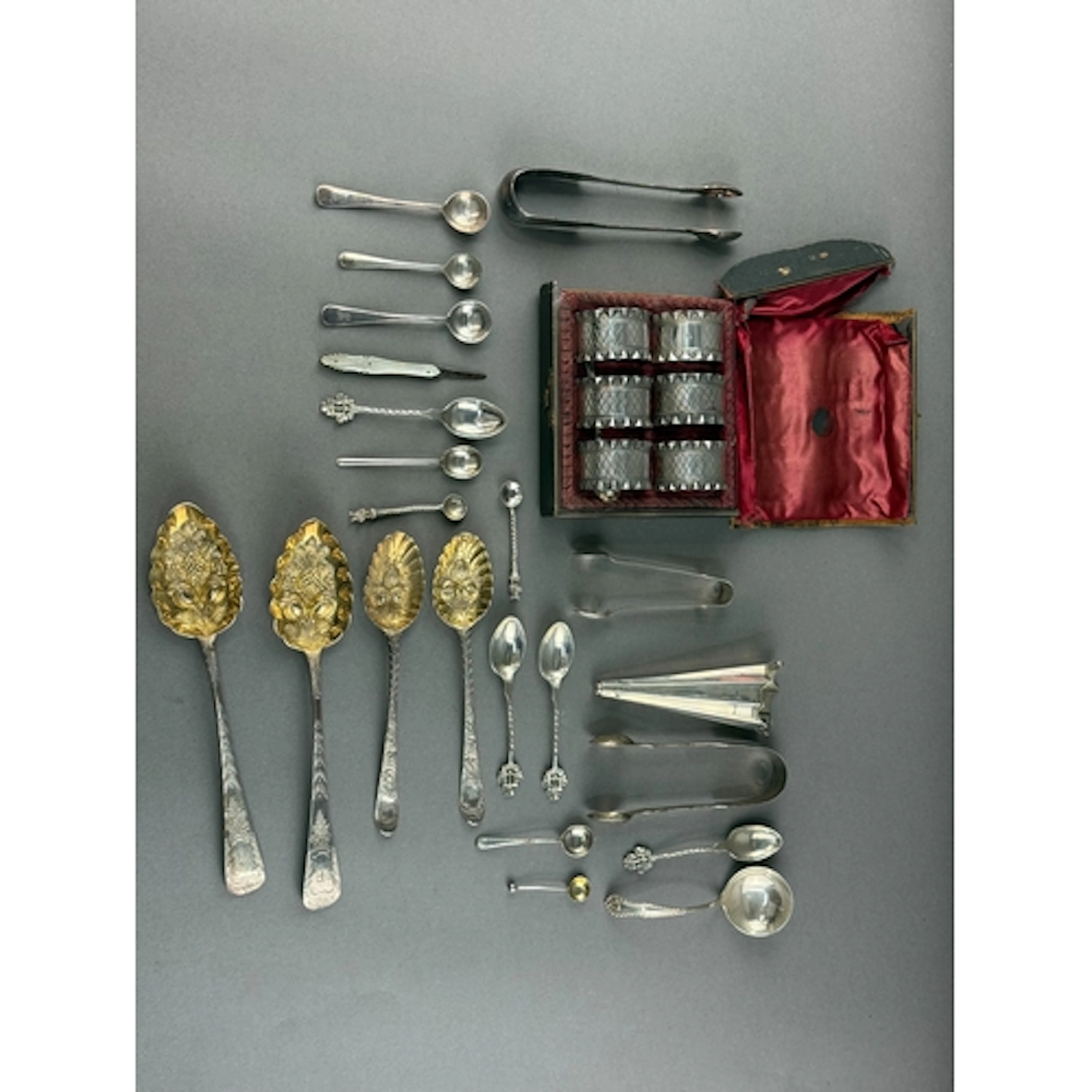 Silver and Plate; two pairs of Georgian spoons later gilded ...